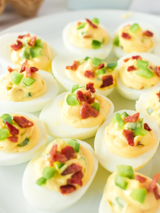close up of deviled eggs on a platter