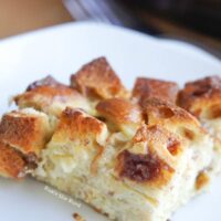 A slice of casserole on a plate.