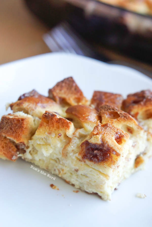 A slice of casserole on a plate.