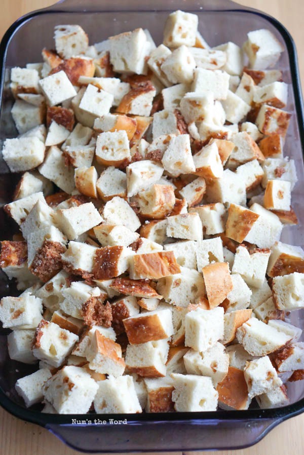 Bagel pieces placed in a 9x13 casserole dish.