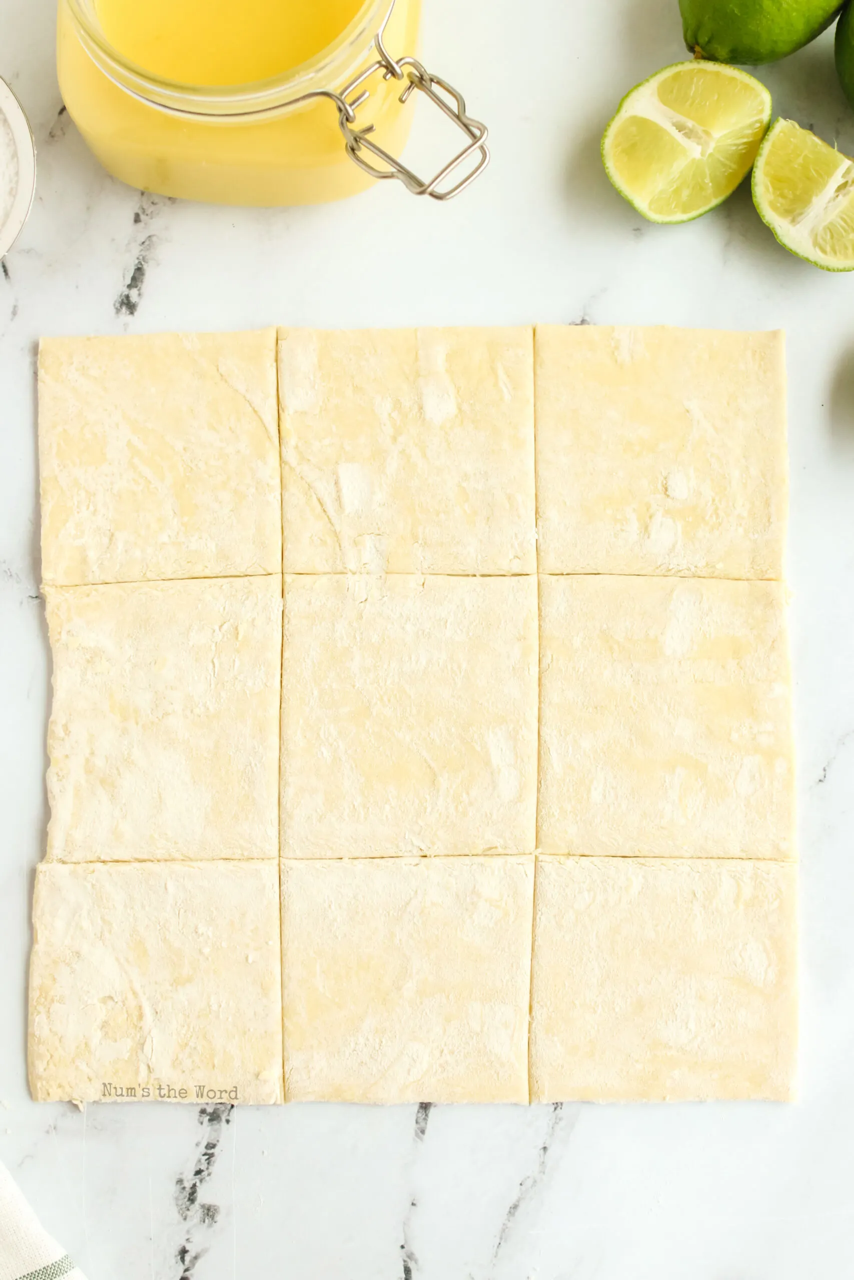 puff pastry sheet cut into 9 squares.