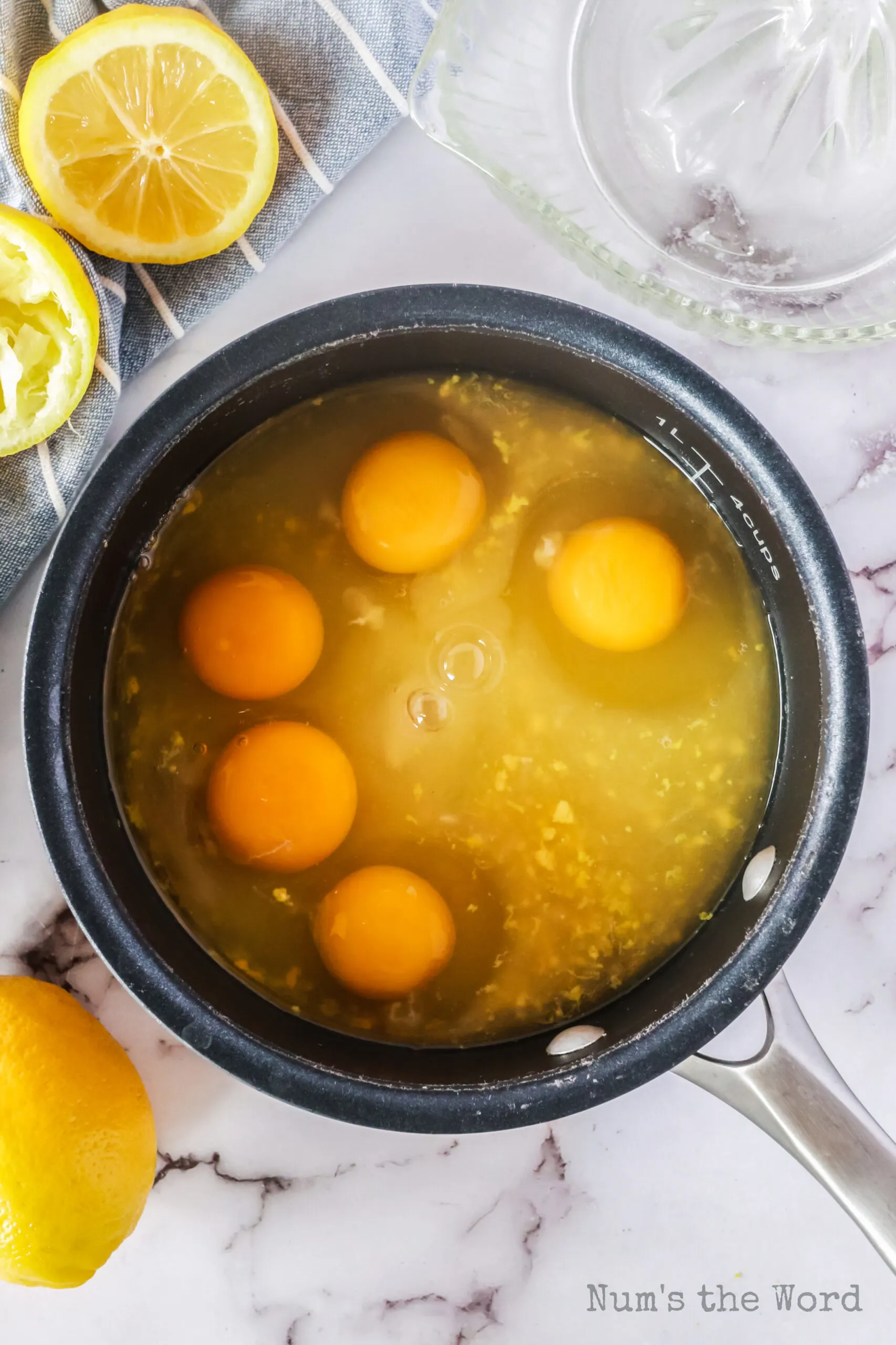 lemon zest, lemon juice, white sugar, eggs and salt all in a pot, umixed