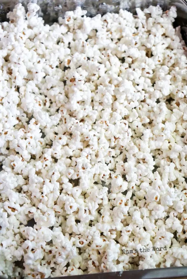 white chocolate mixed into popcorn