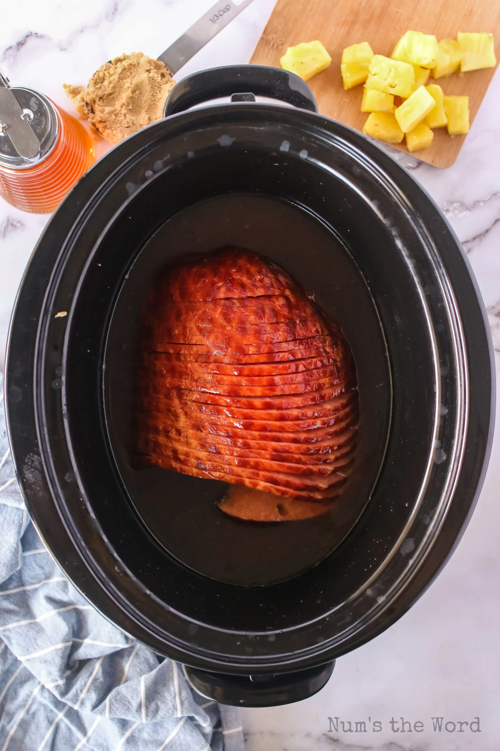 How To Slow Cook a Precooked Ham In The Oven - Lauren's Latest