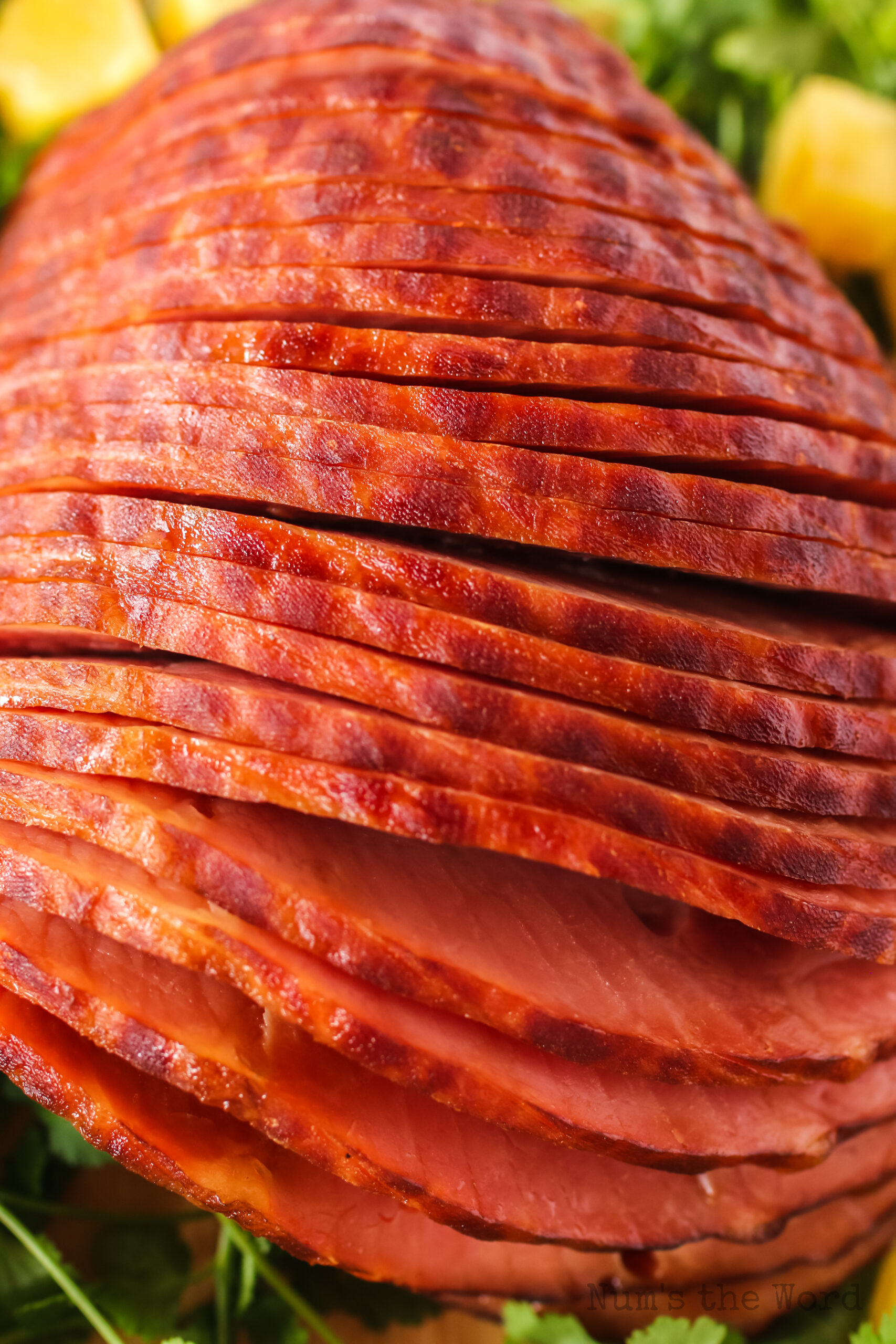 top view of ham on platter, close up.