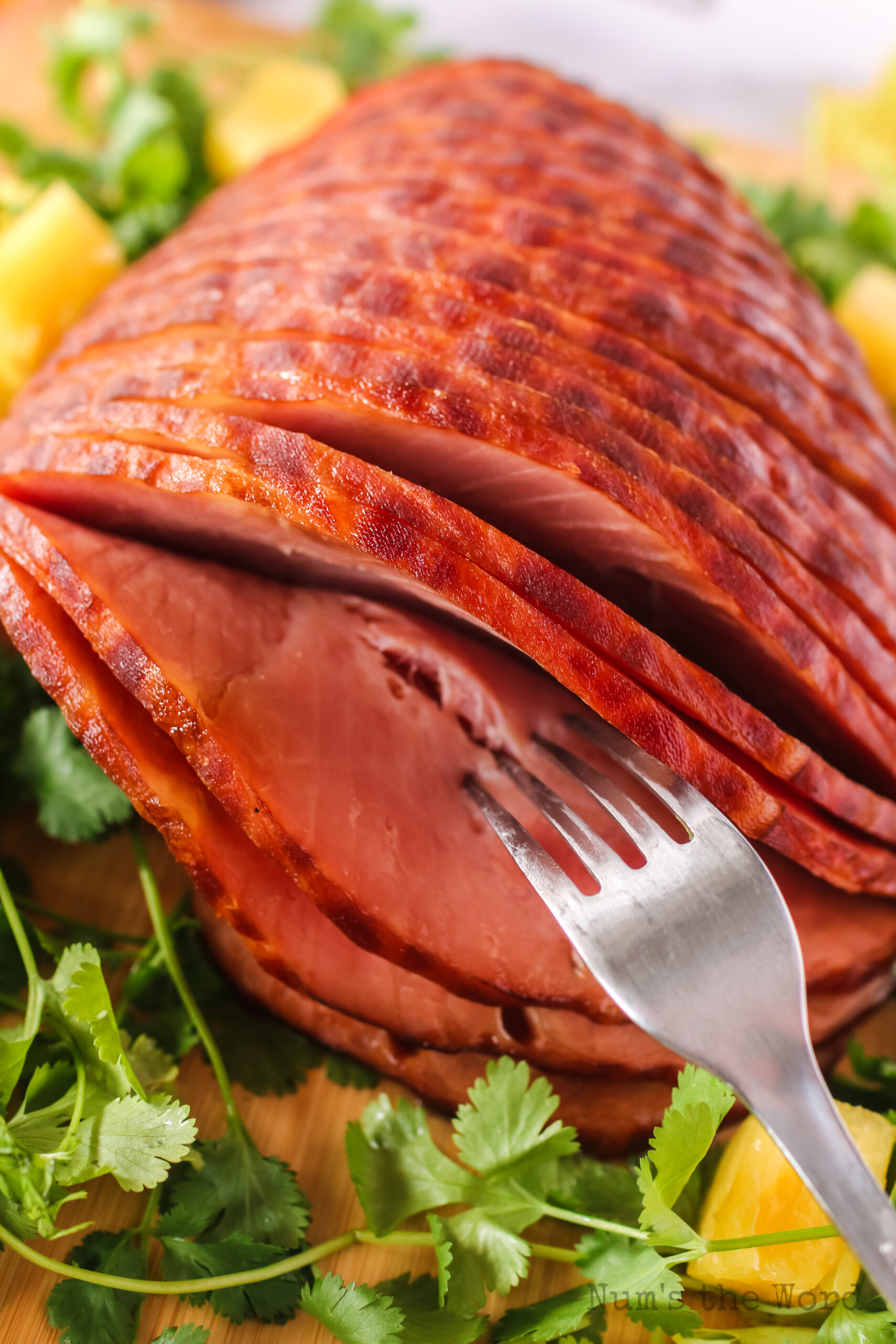 sliced ham on a tray with a