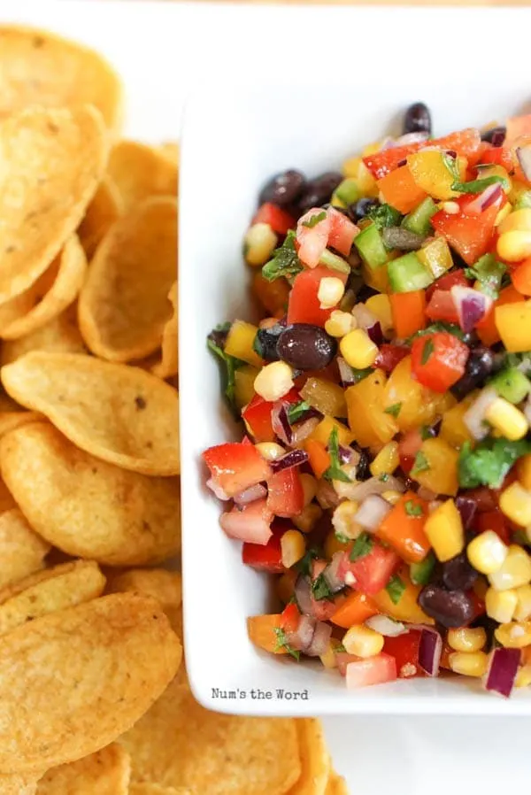 Black Bean Corn Salsa - salsa in a serving bowl next to corn chips