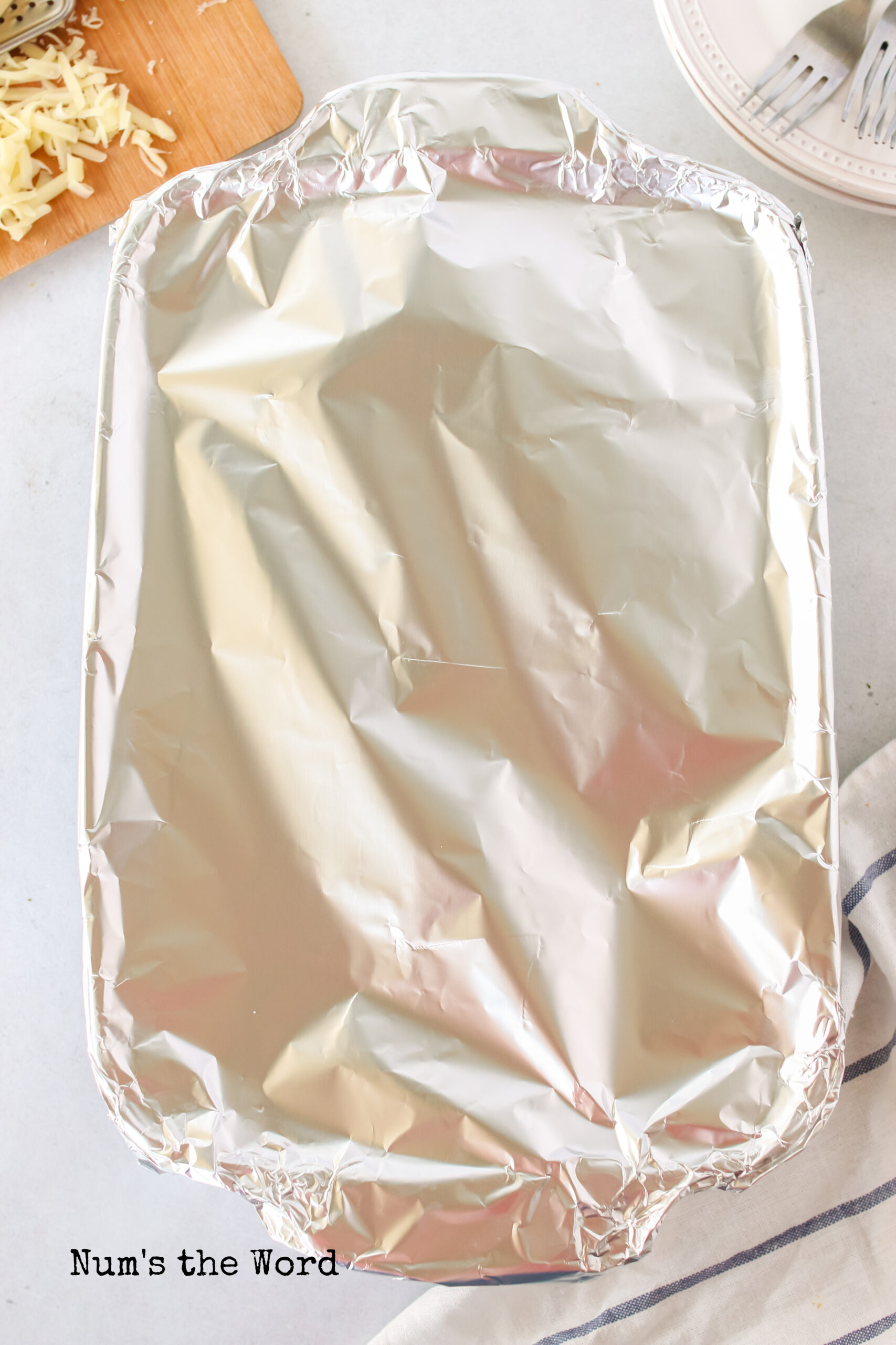 casserole covered in foil and ready to go into the oven
