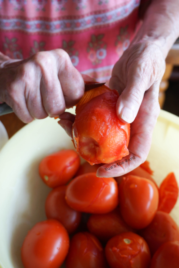 Peeling whole tomatoes