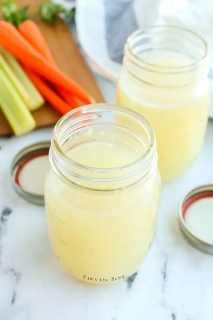 Finished bone broth poured into jars