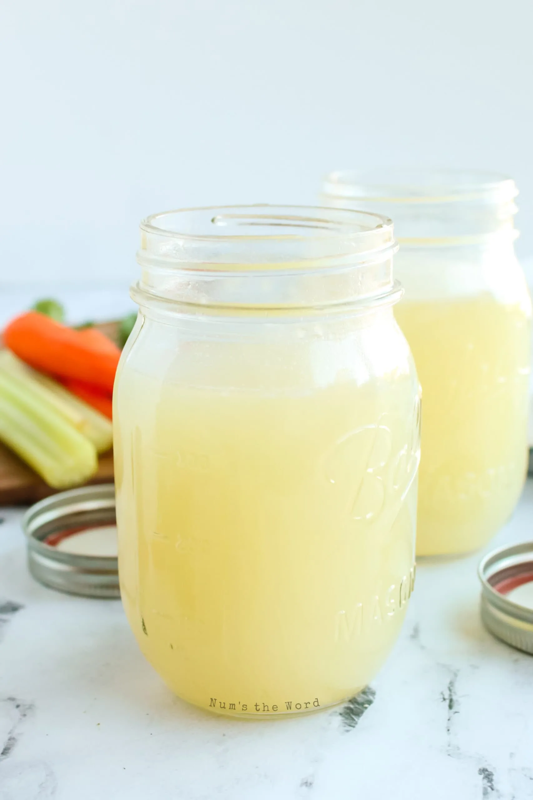 side view of bone broth in jars