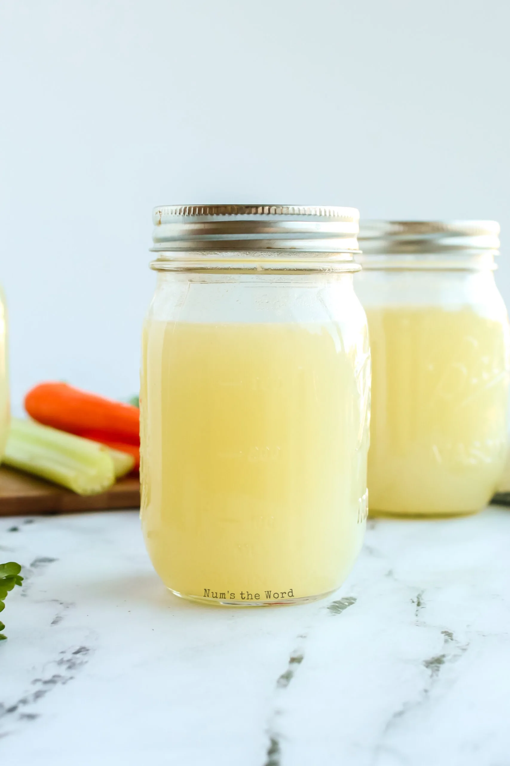 bone broth in jars with lids on them for fridge or freezer