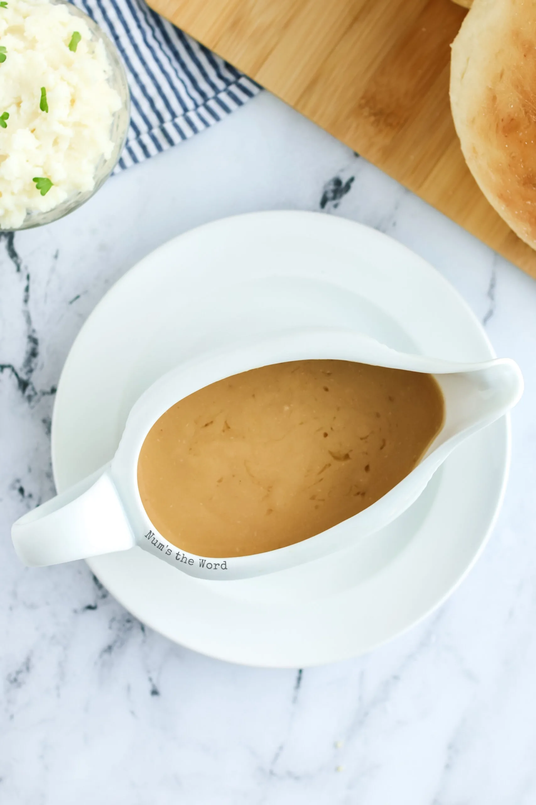 thickened gravy in a gravy boat, zoomed out image