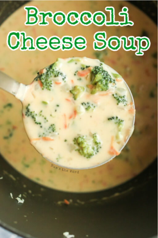 A bowl of cream of broccoli soup topped with grated cheese and croutons