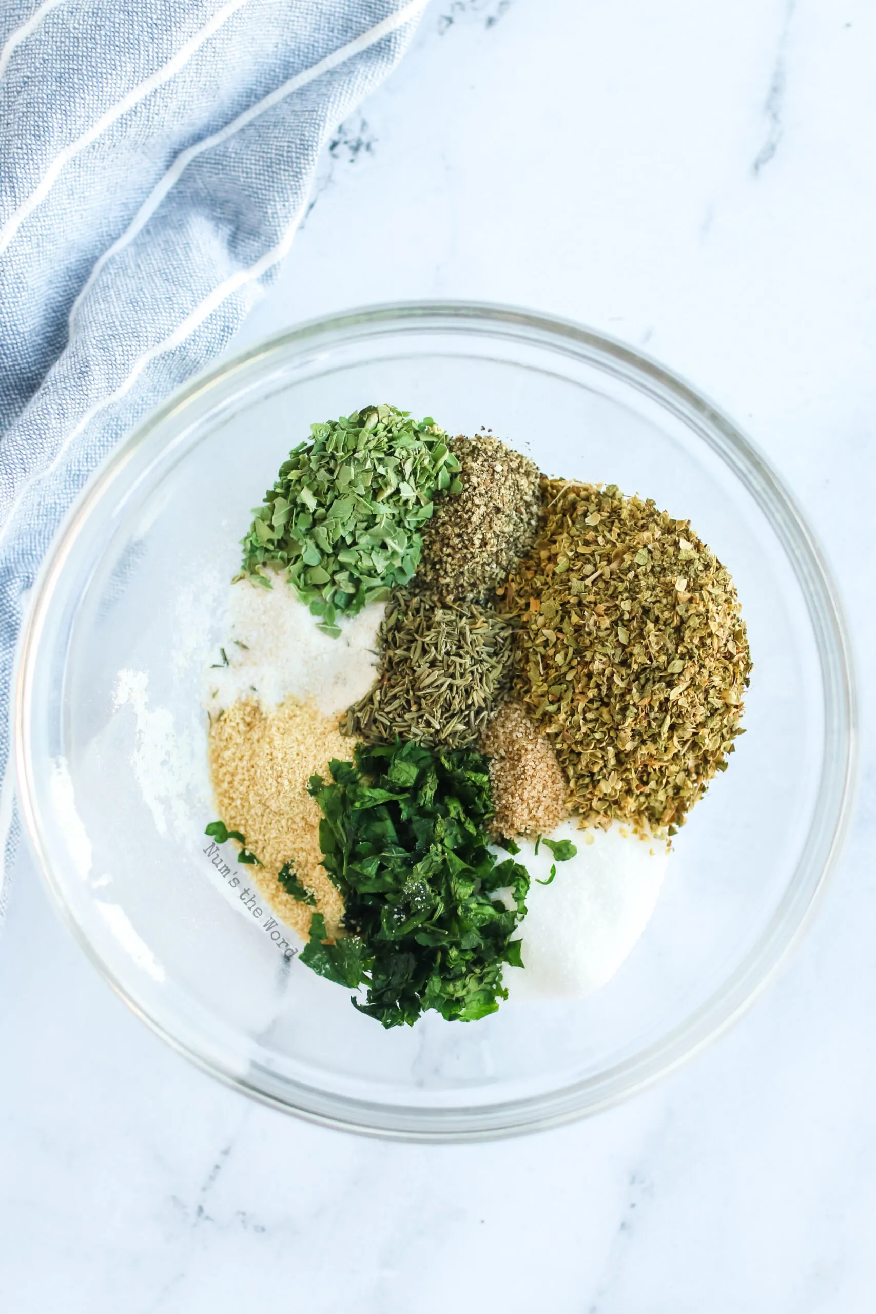 Each seasoning placed in a bowl next to each other, but not mixed.