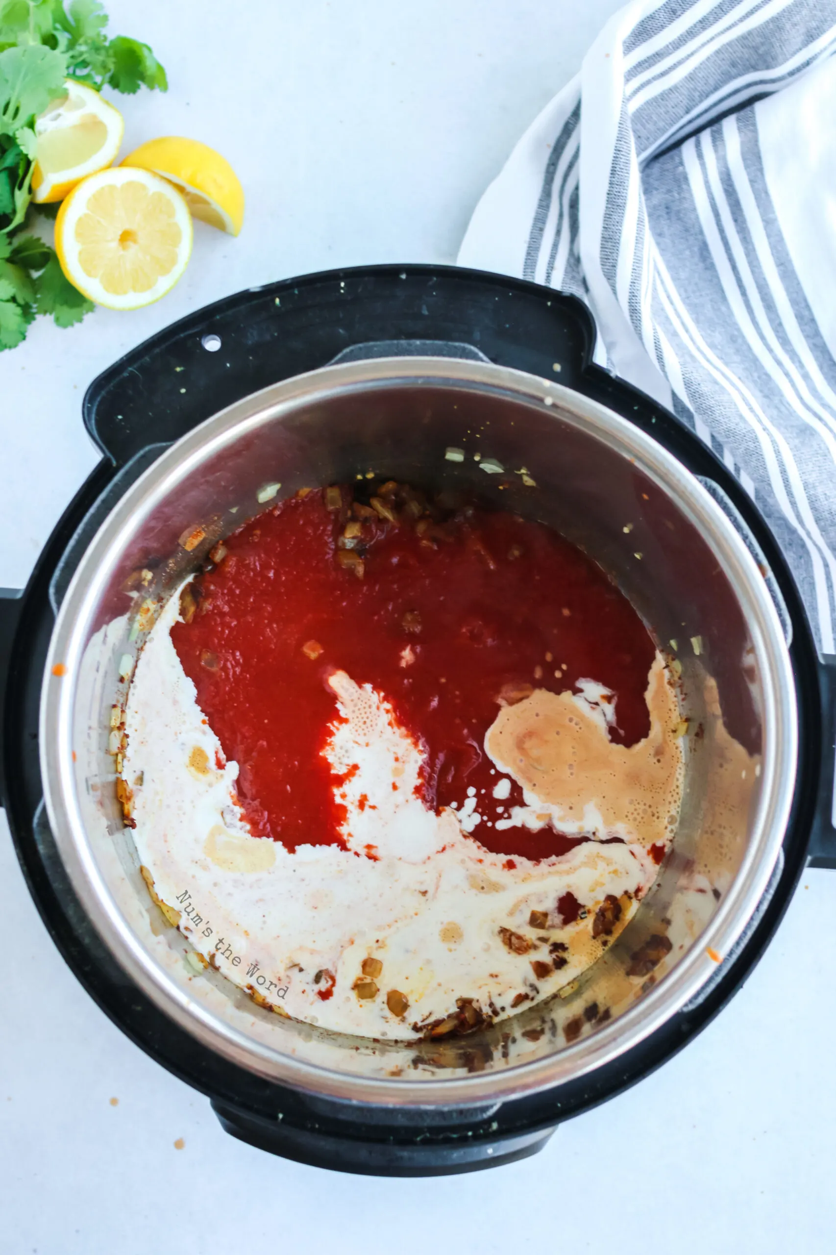 tomato sauce and heavy cream added to onion mixture.