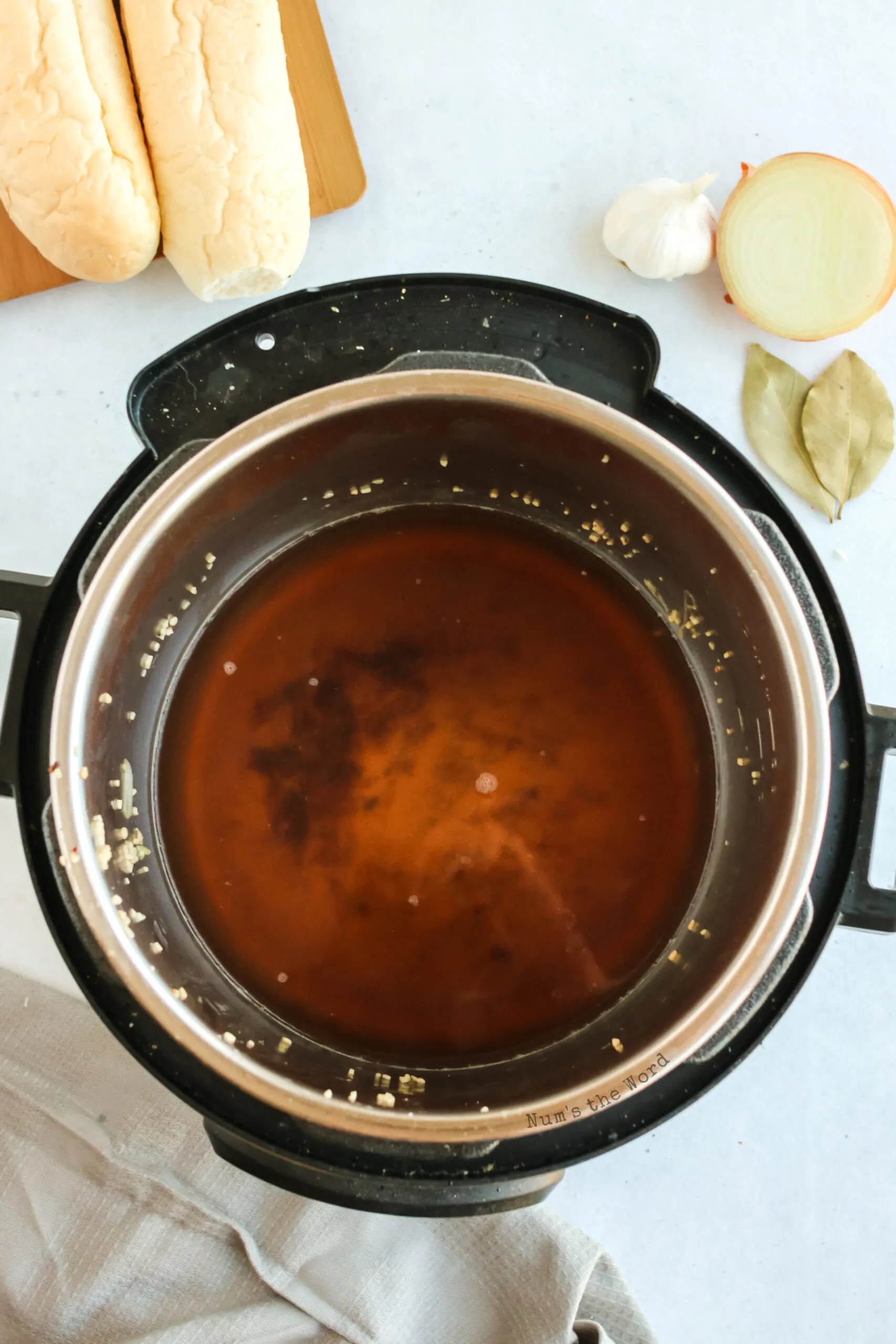 beef and drippings cooking in instant pot