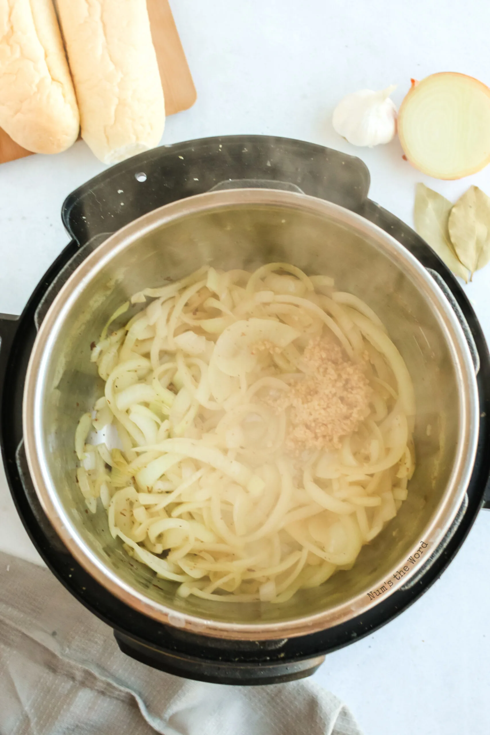 onions being cooked down in instant pot