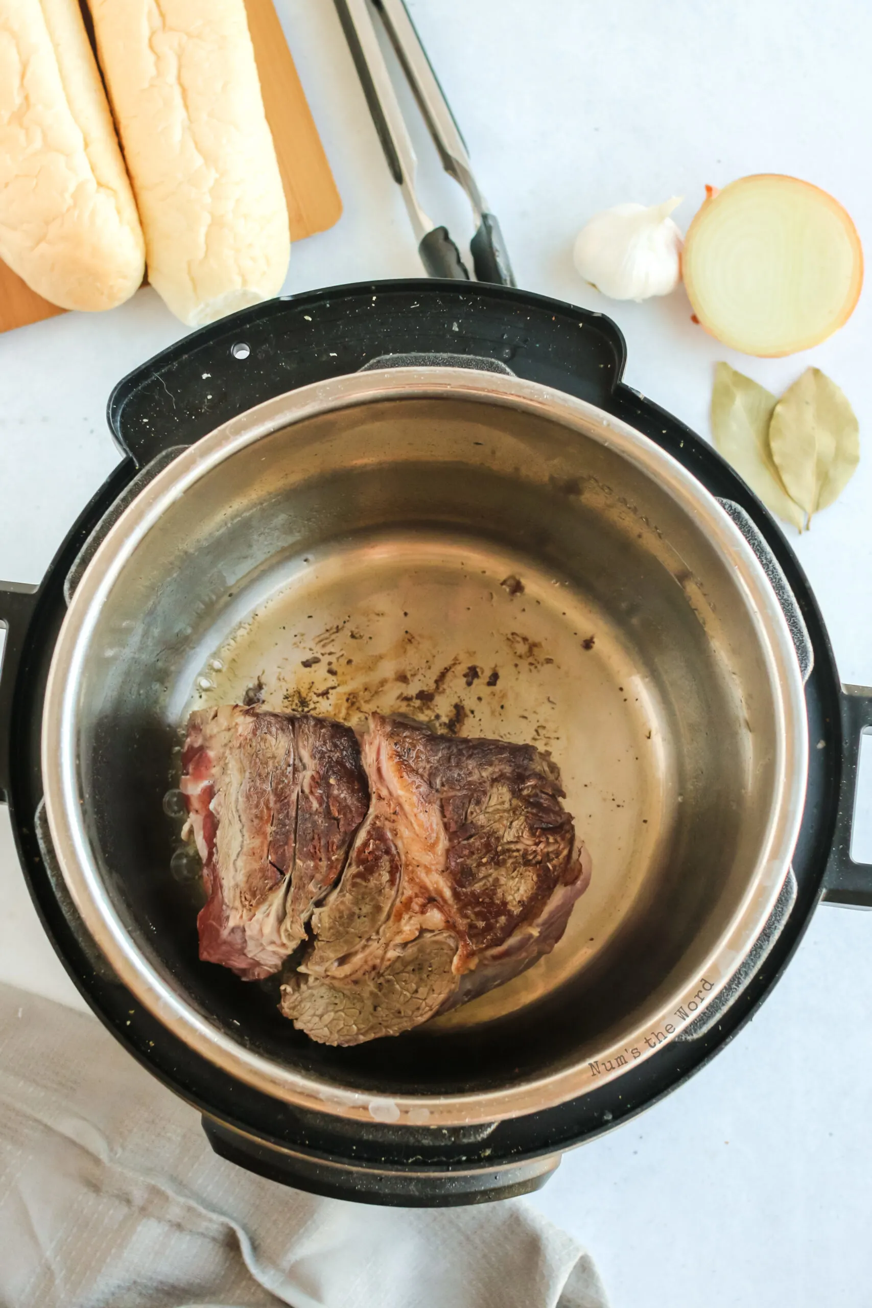 beef in instant pot being seared