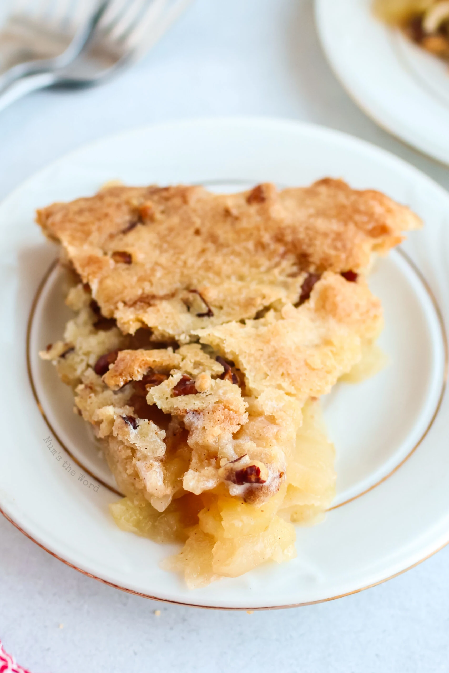 Slice of Swedish apple pie on a plate.