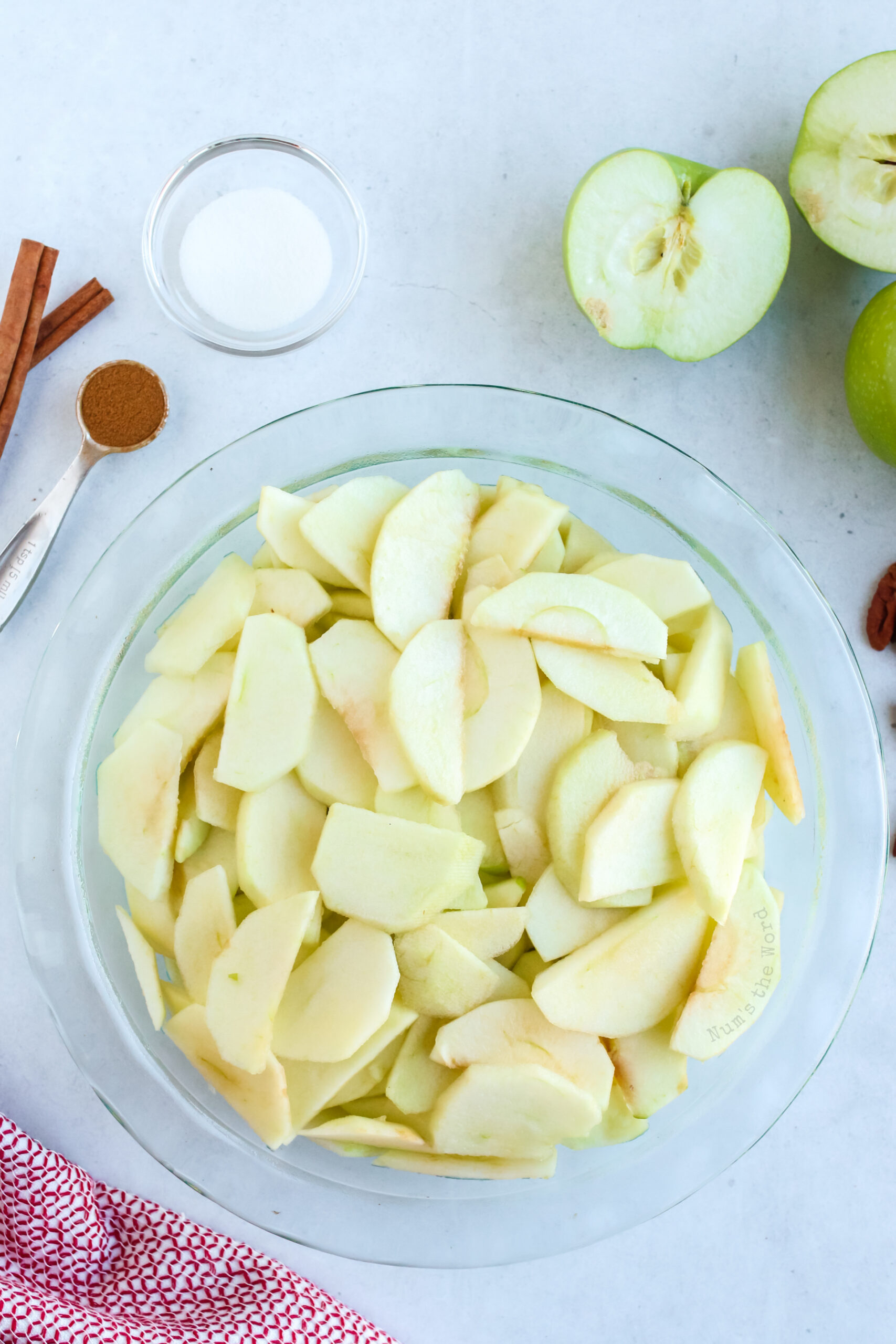 Sliced apples in a pie plate