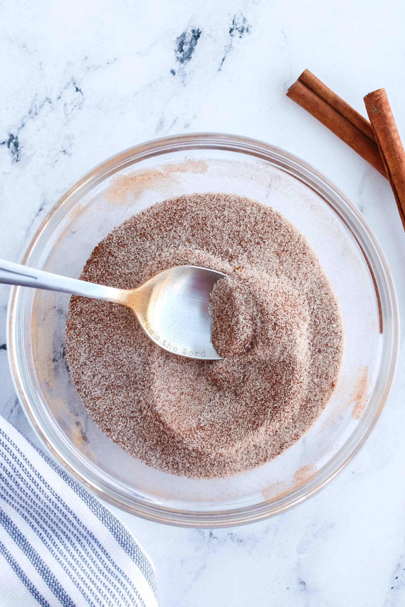 bowl of cinnamon sugar mixed together in a bowl.