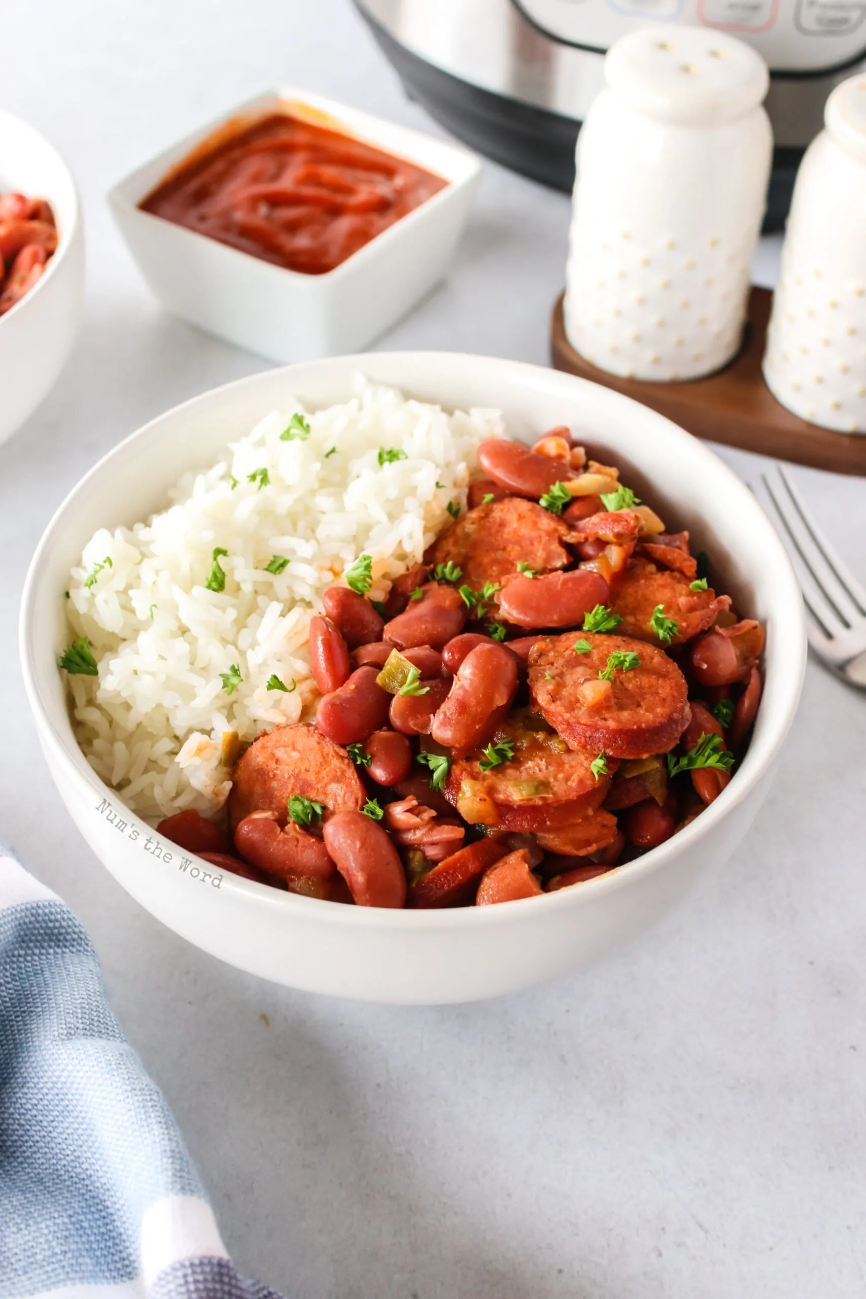 side view of red beans and rice in a bowl