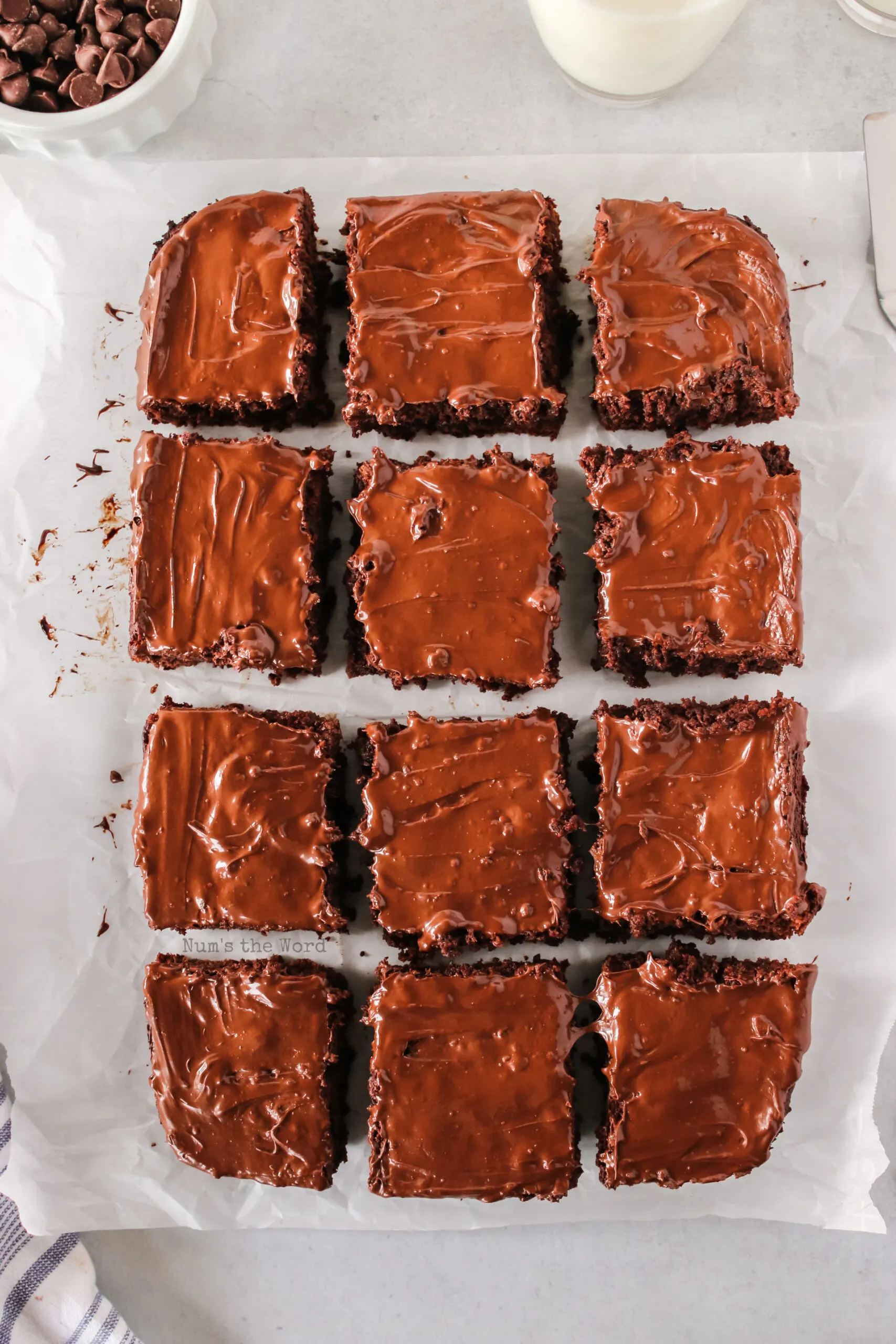 cooled brownie slab removed from pan. Then cut into 12 squares