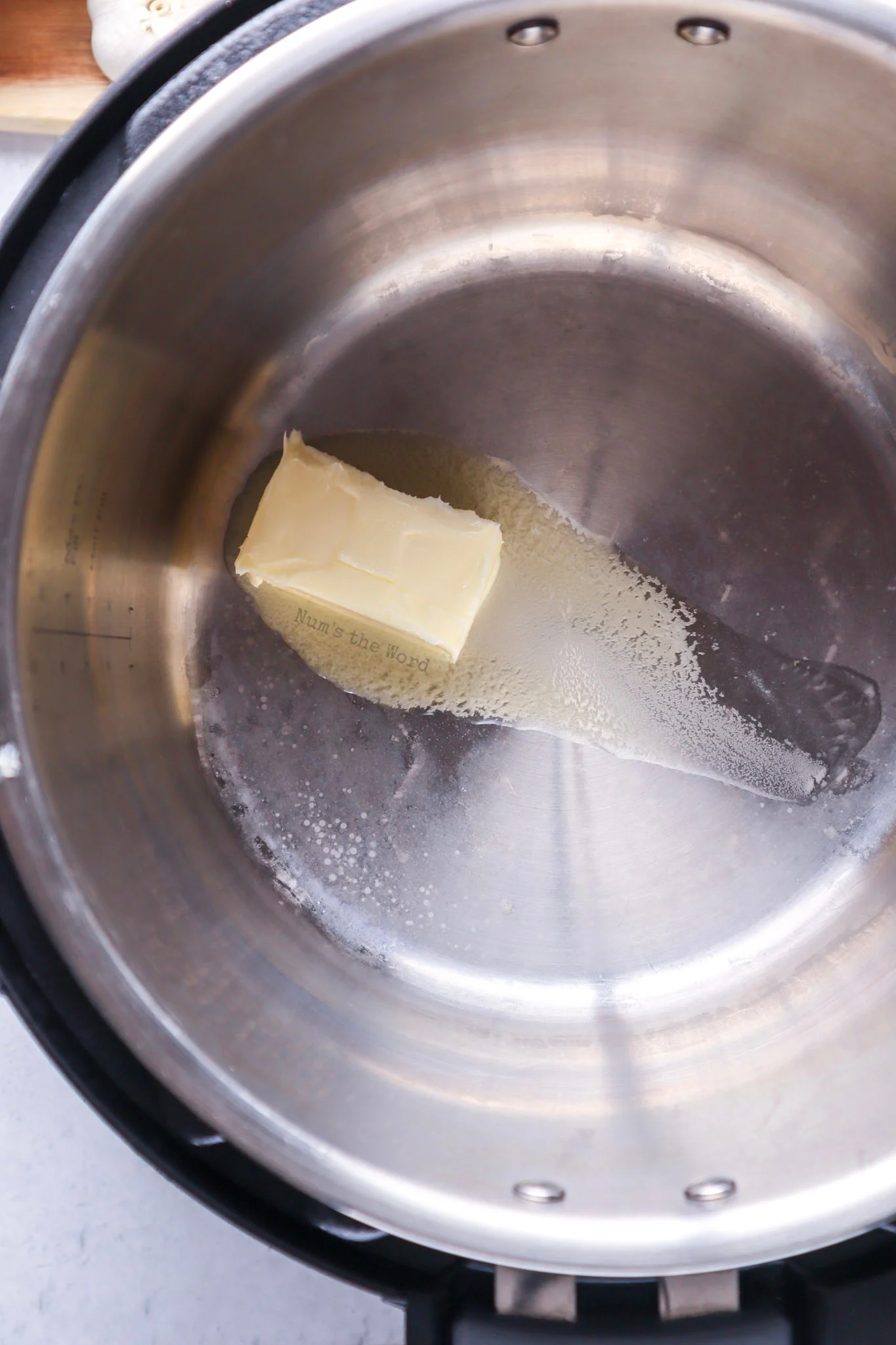 Butter added to instant pot with saut&eacute; function on. 