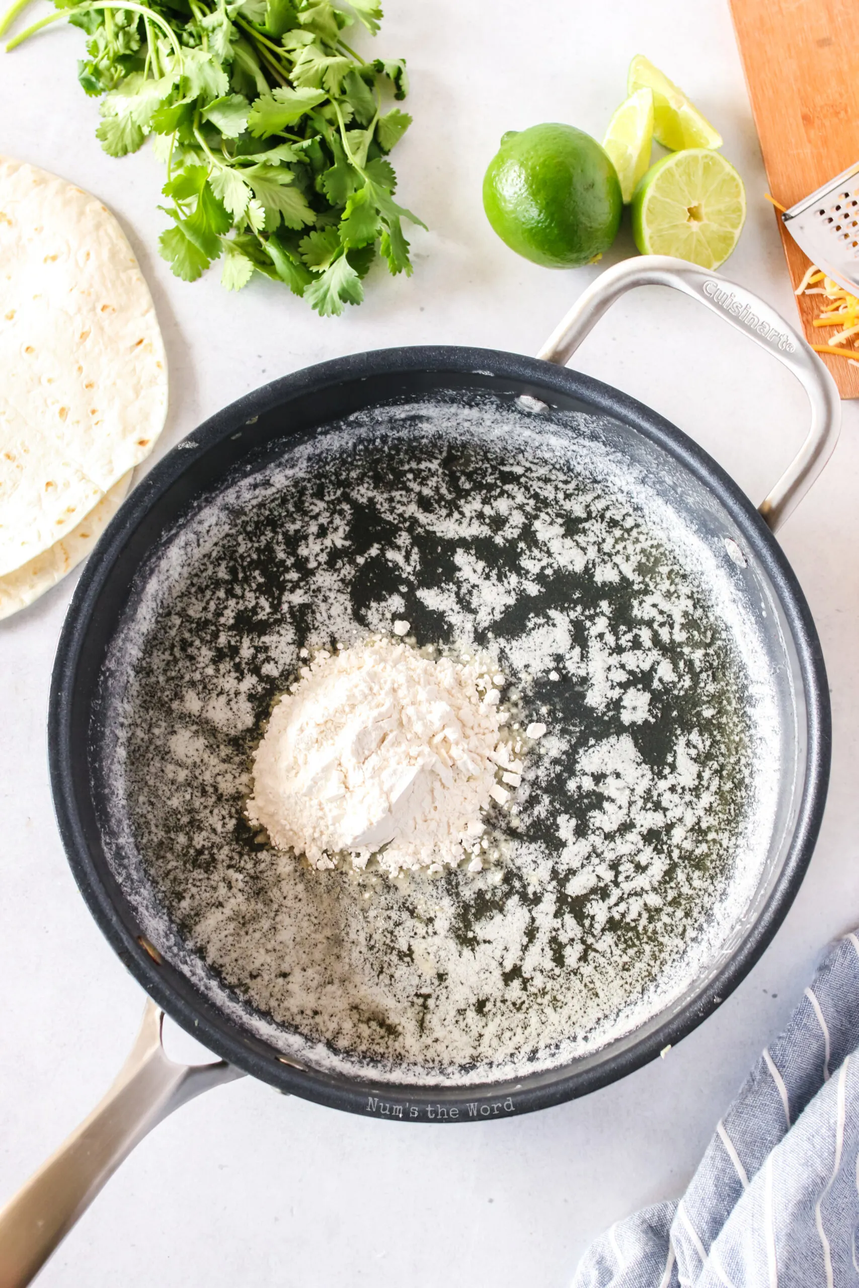 butter and flour in a skillet, ready to be cooked into a roux.