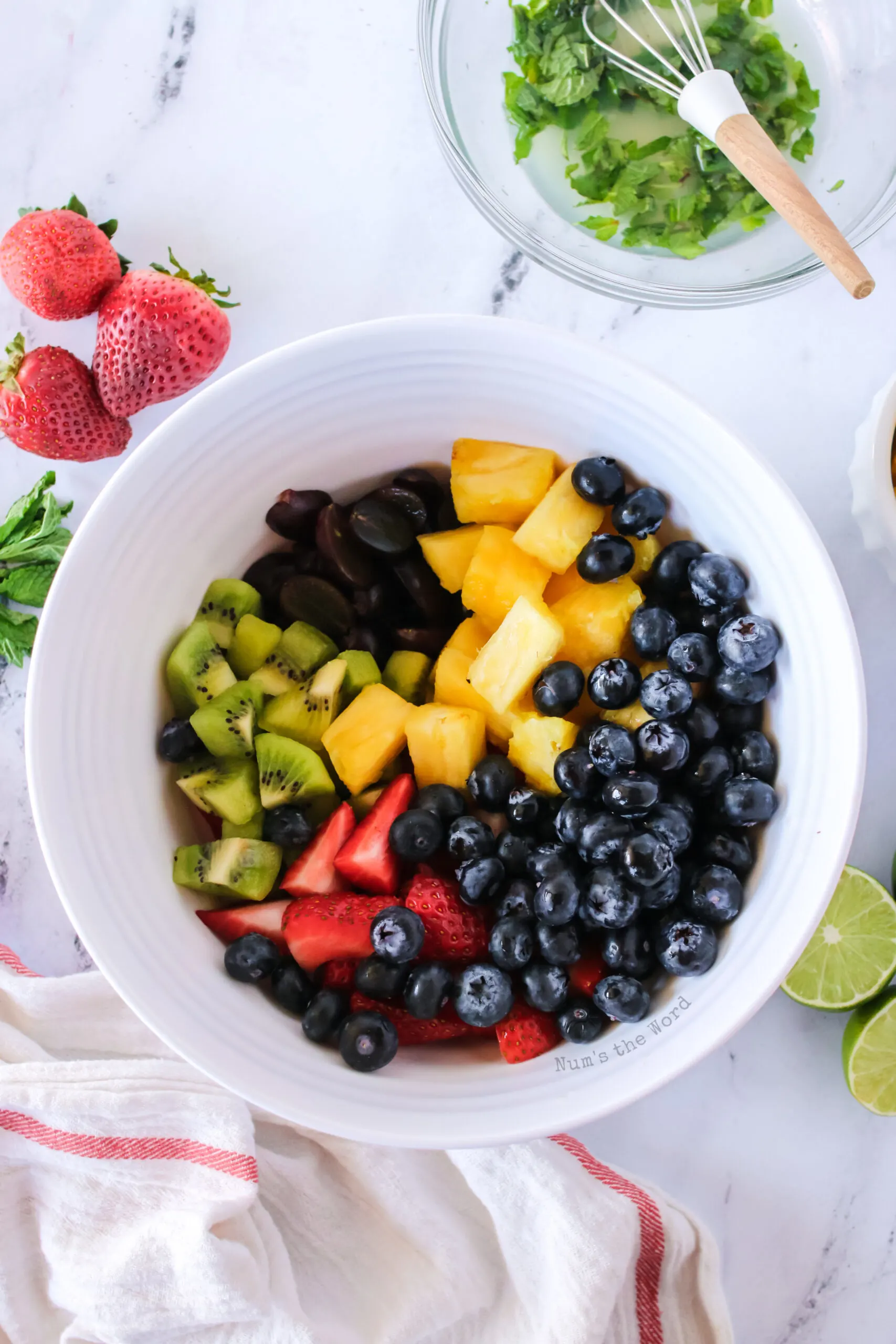 all cut fresh fruit in a bowl, not mixed.