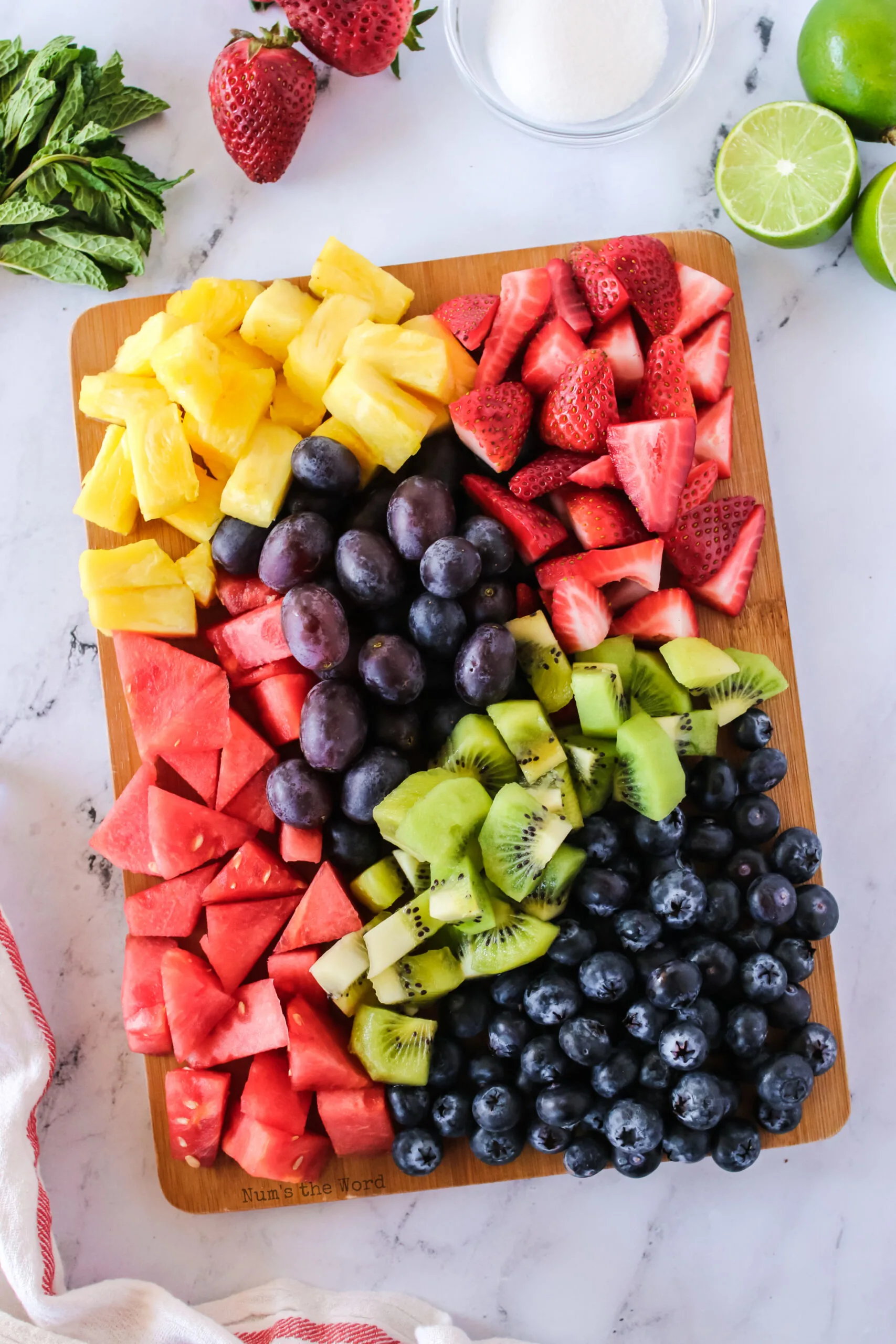 All cut fruits on a cutting board