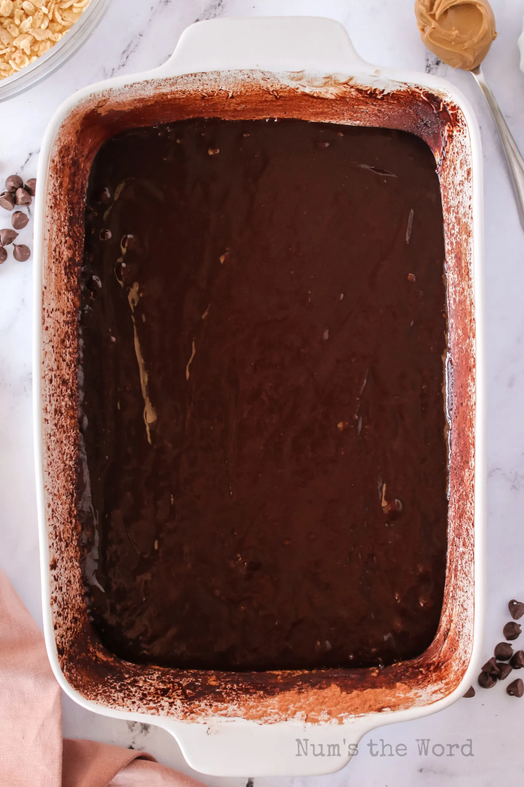 Brownie mix poured into pan, uncooked