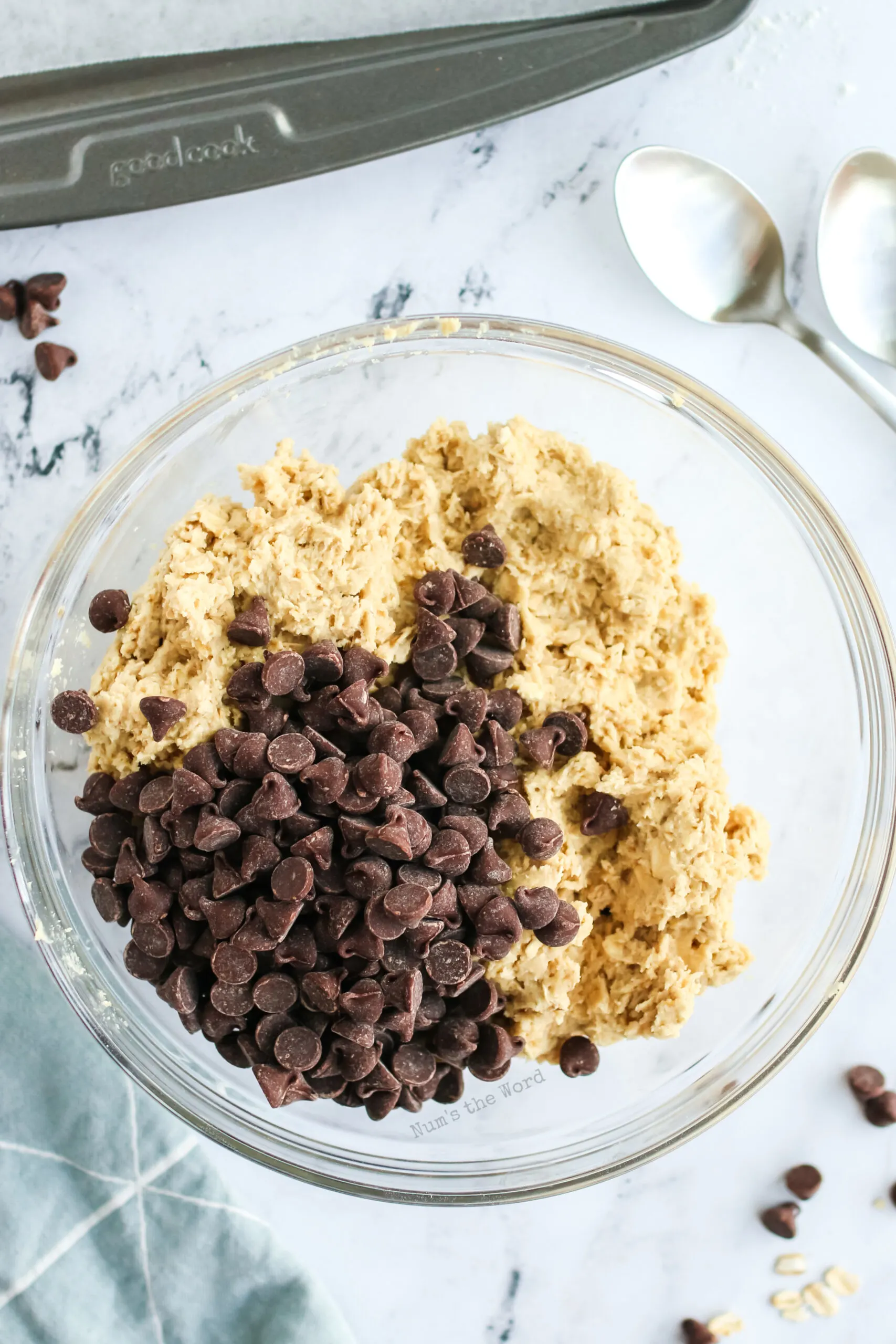 oatmeal cookie dough with chocolate chips added on top.