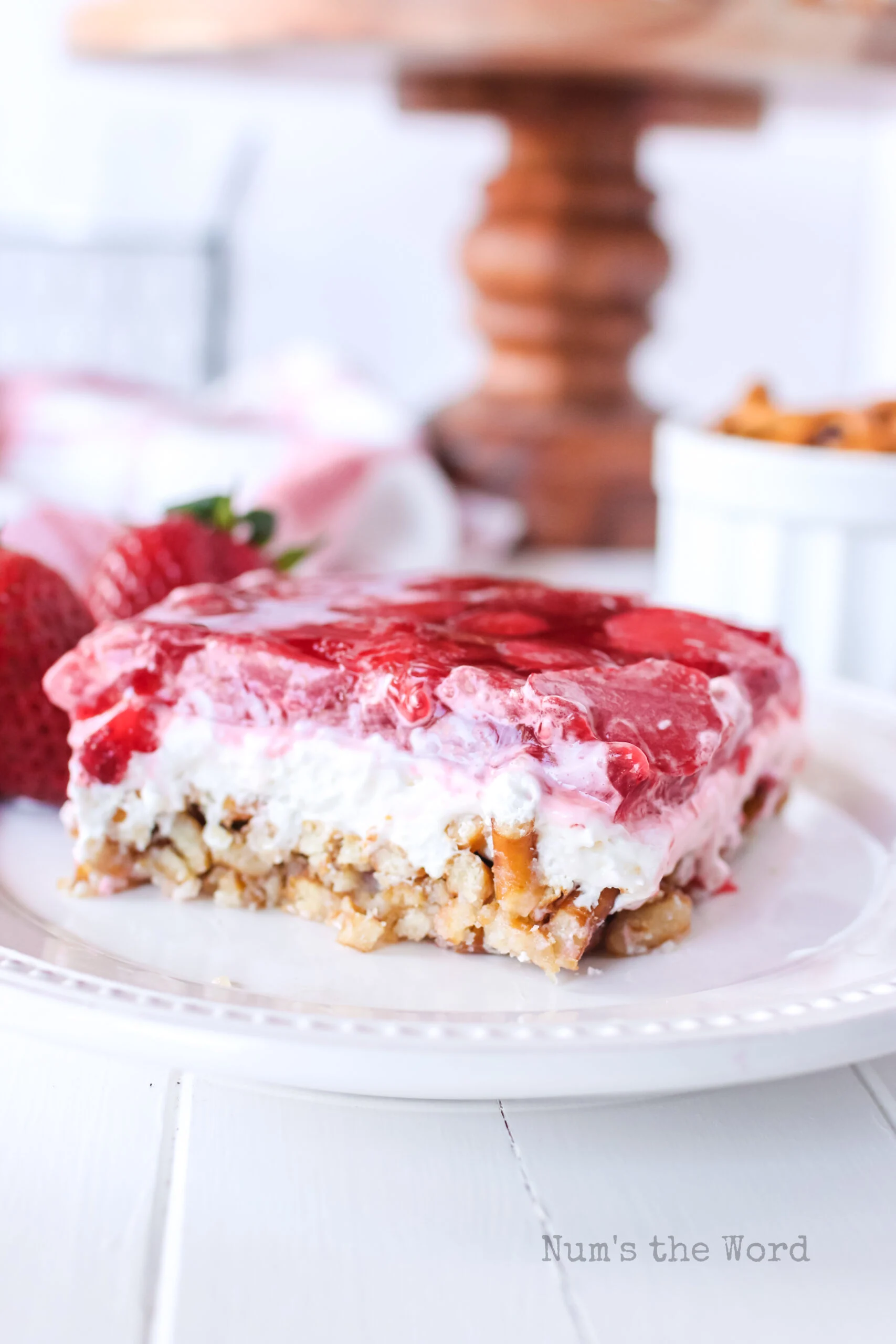 side view of jello dessert on plate showing off the layers