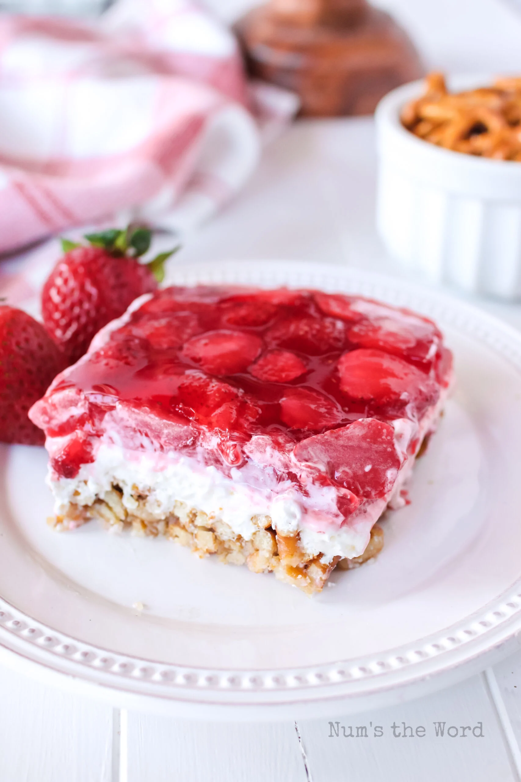 top side angled shot of a slice of jello dessert on a plate.