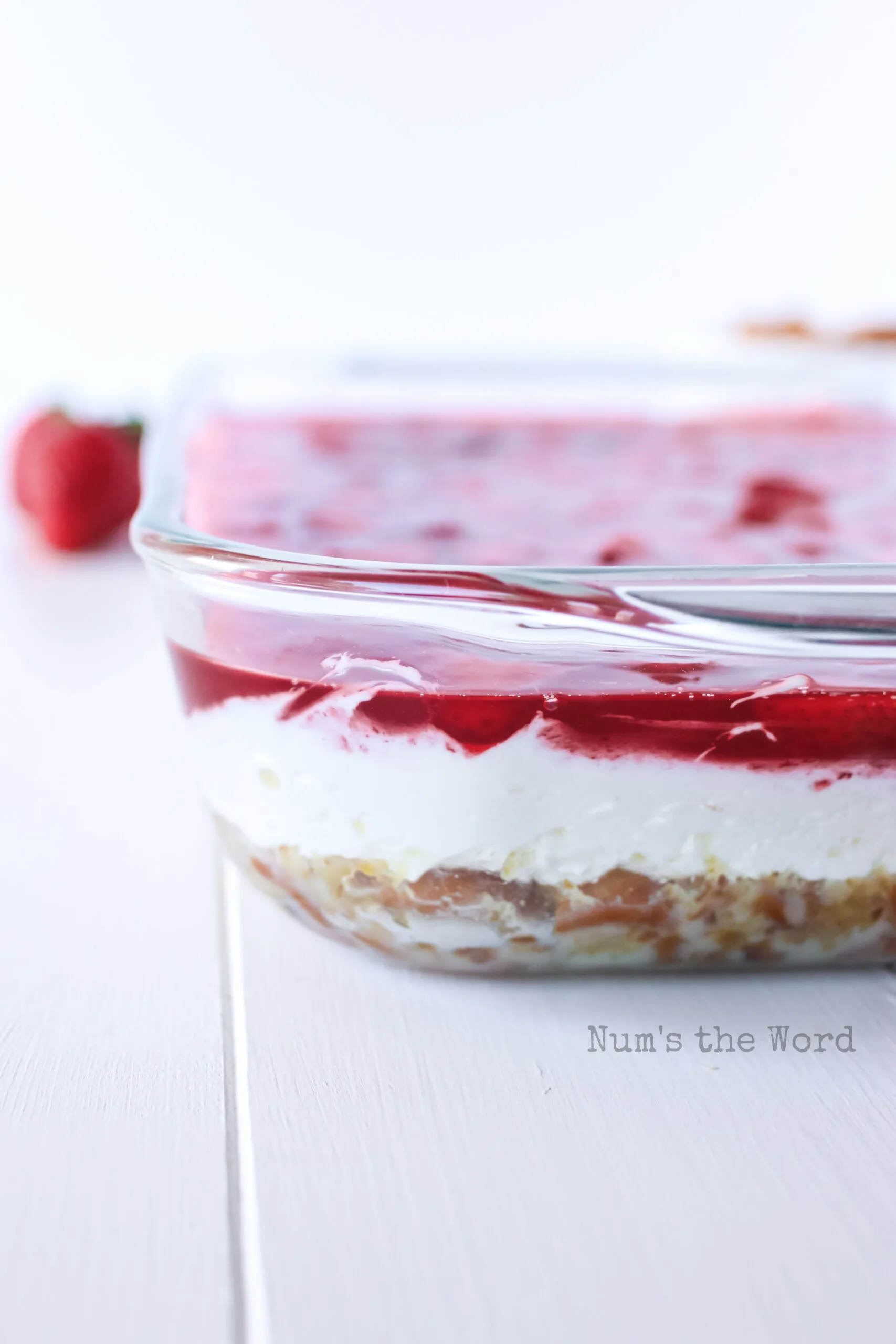 side view showing off all three layers of this jello salad dessert