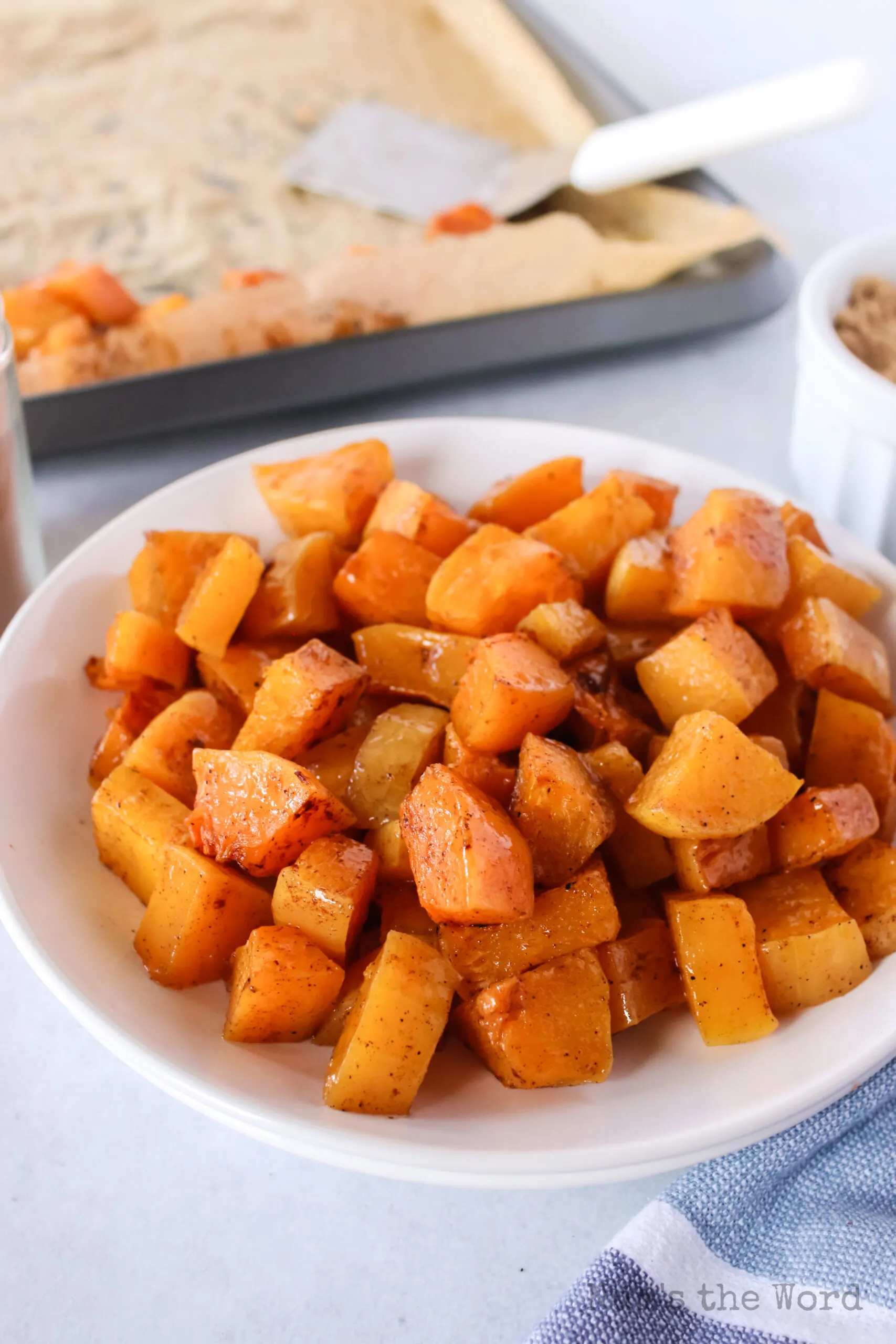 side angle of roasted squash in a bowl, ready to serve.