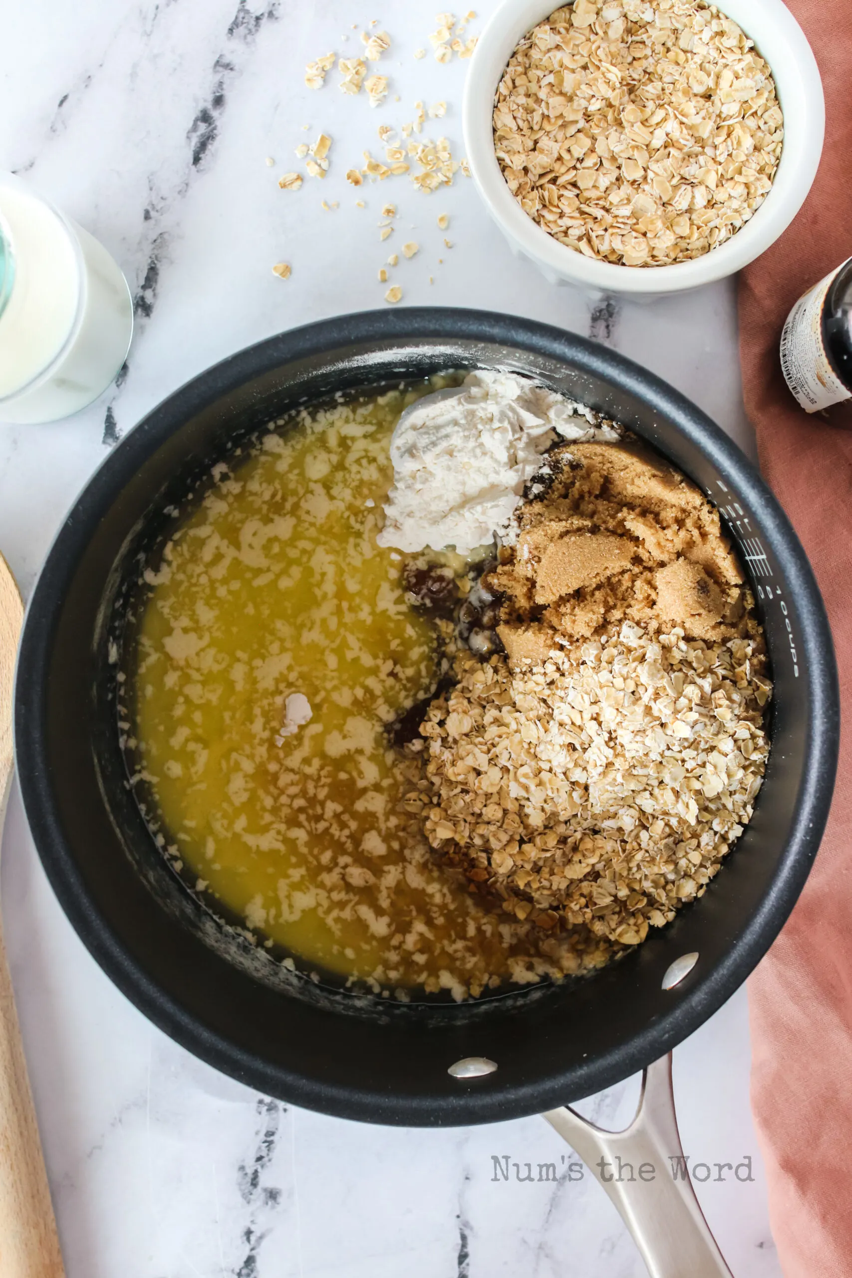 brown sugar, oatmeal, flour, and milk added to melted butter.