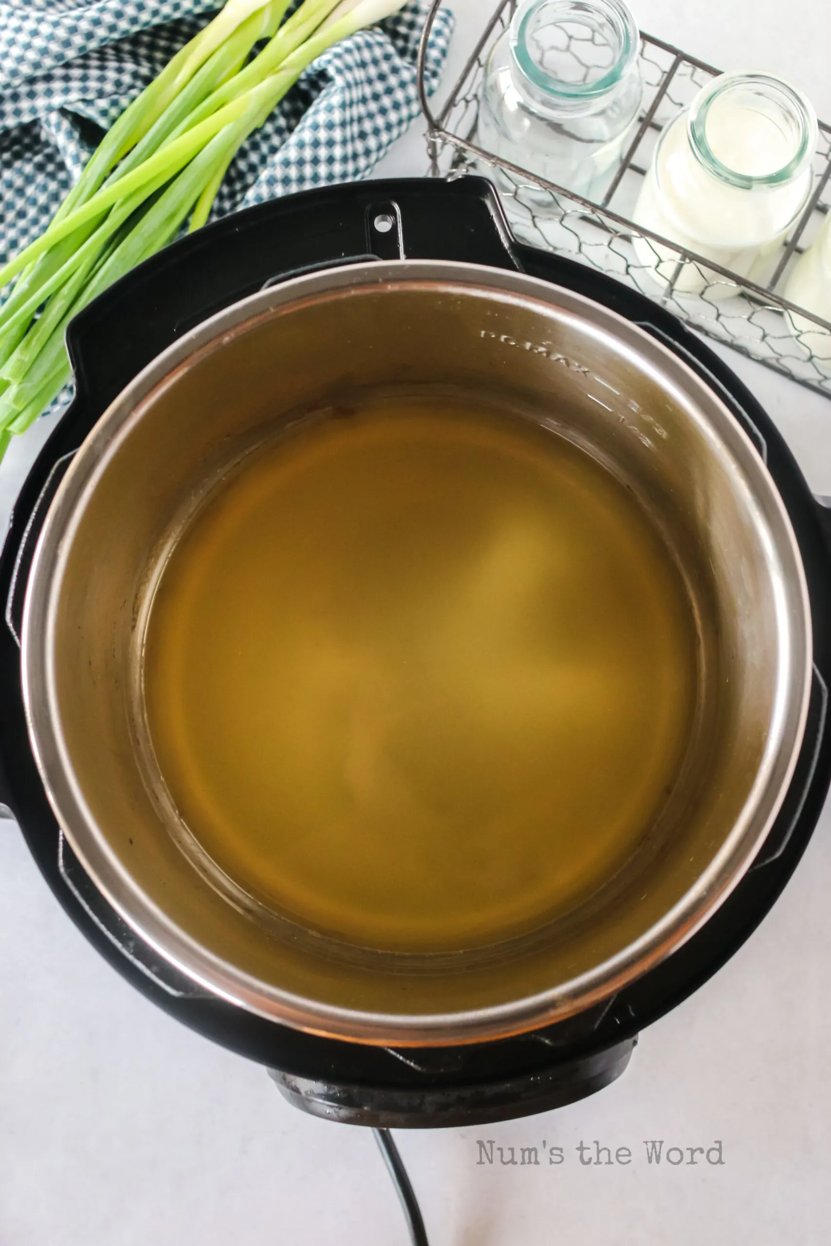 Chicken broth inside the instant pot.