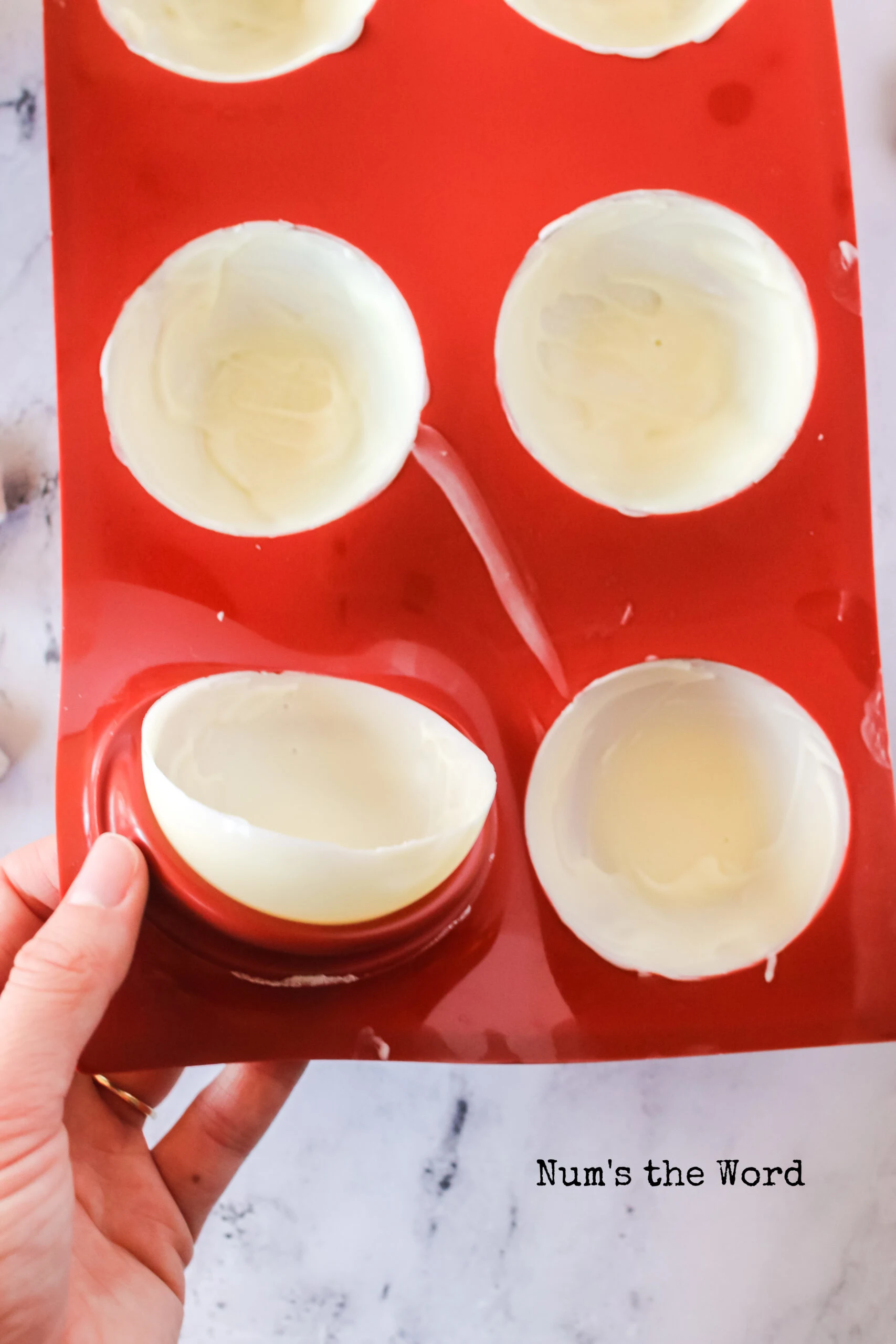 chocolate is dried in hot cocoa molds and ready to remove.