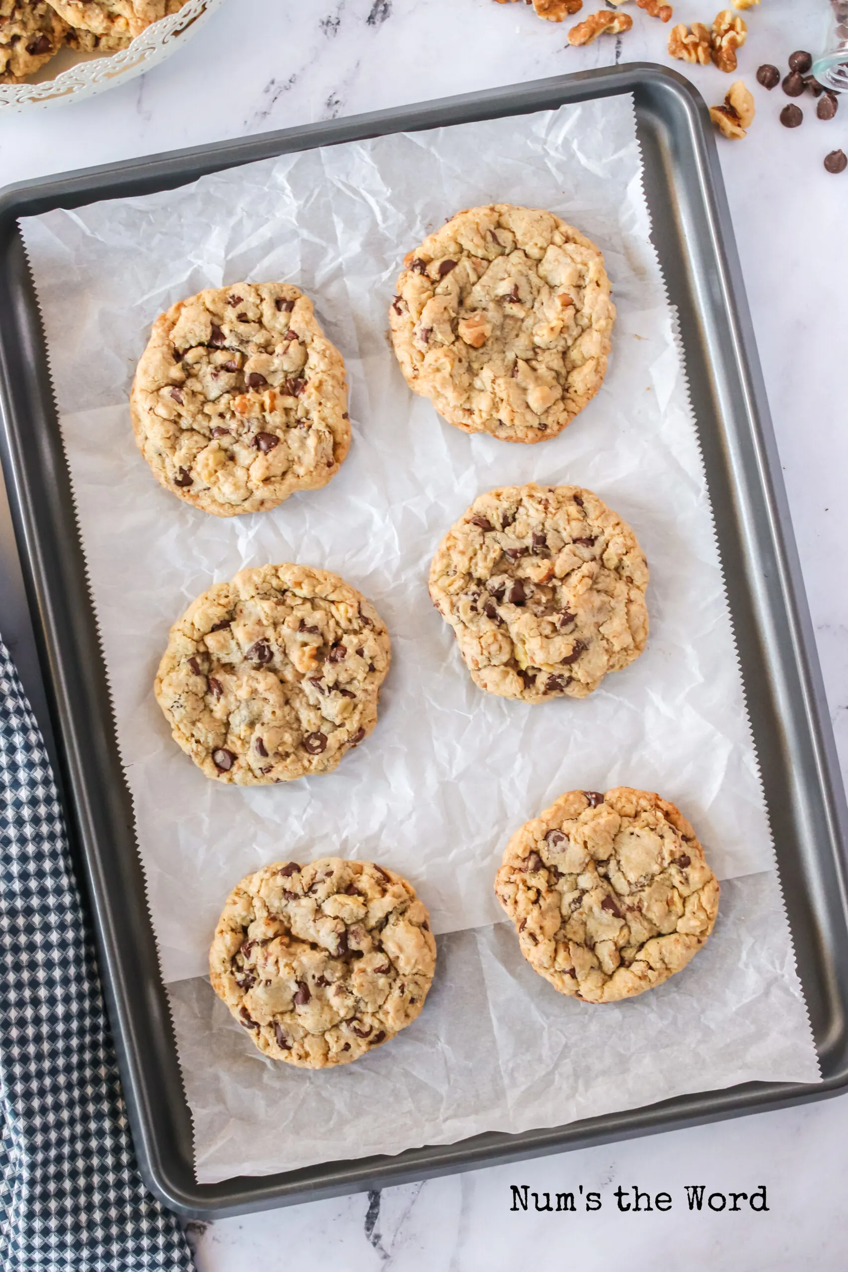 Fresh baked cookies on a cookie sheet.