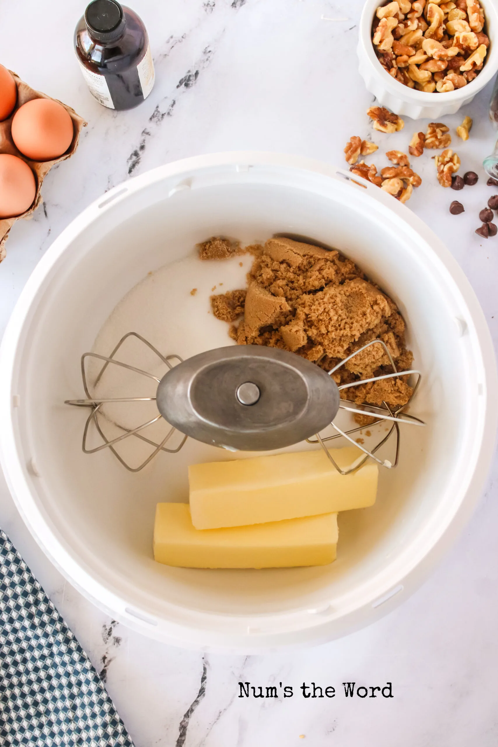 butter and brown sugar in a mixing bowl, unmixed.