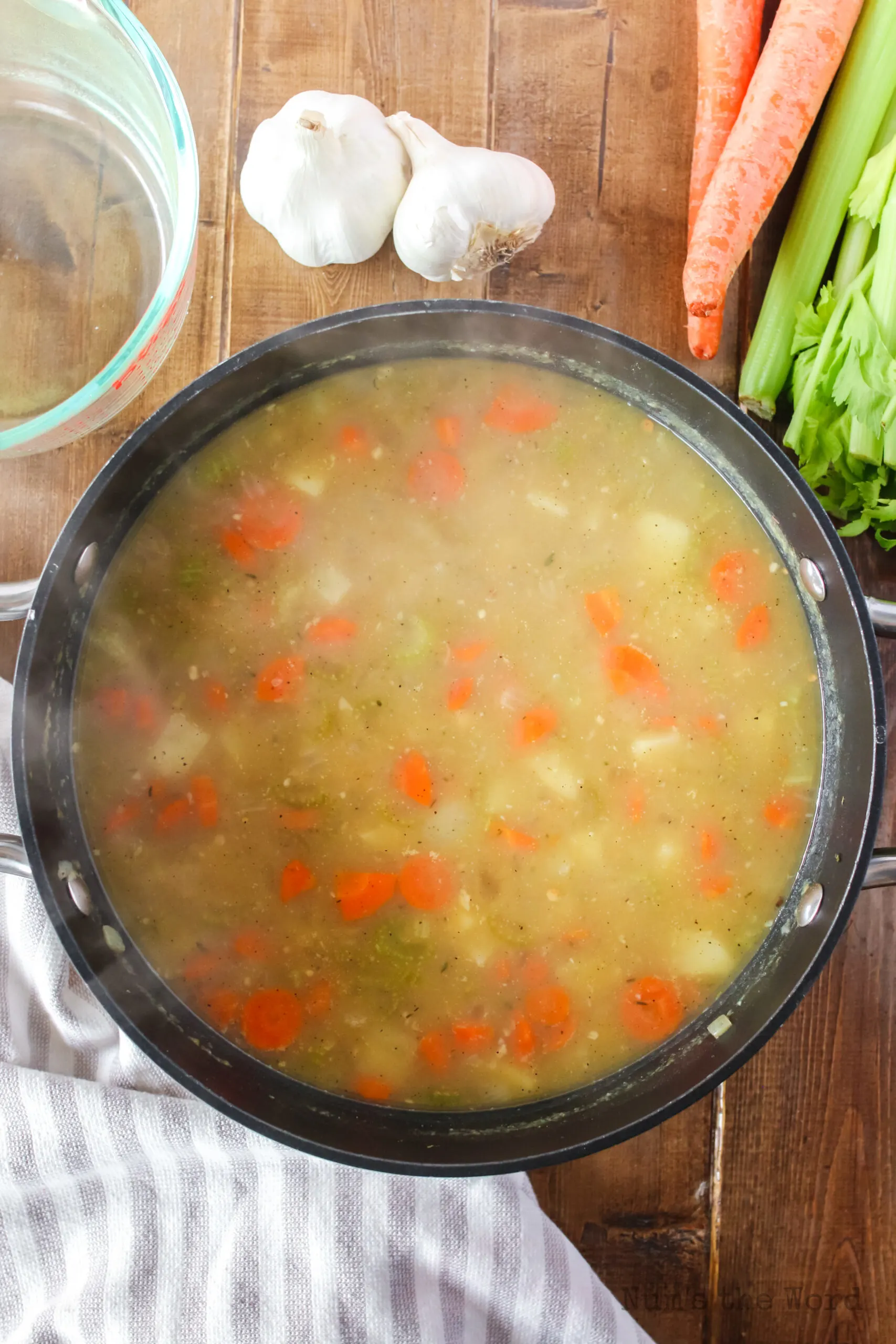 chicken broth and seasonings added to potato mixture.