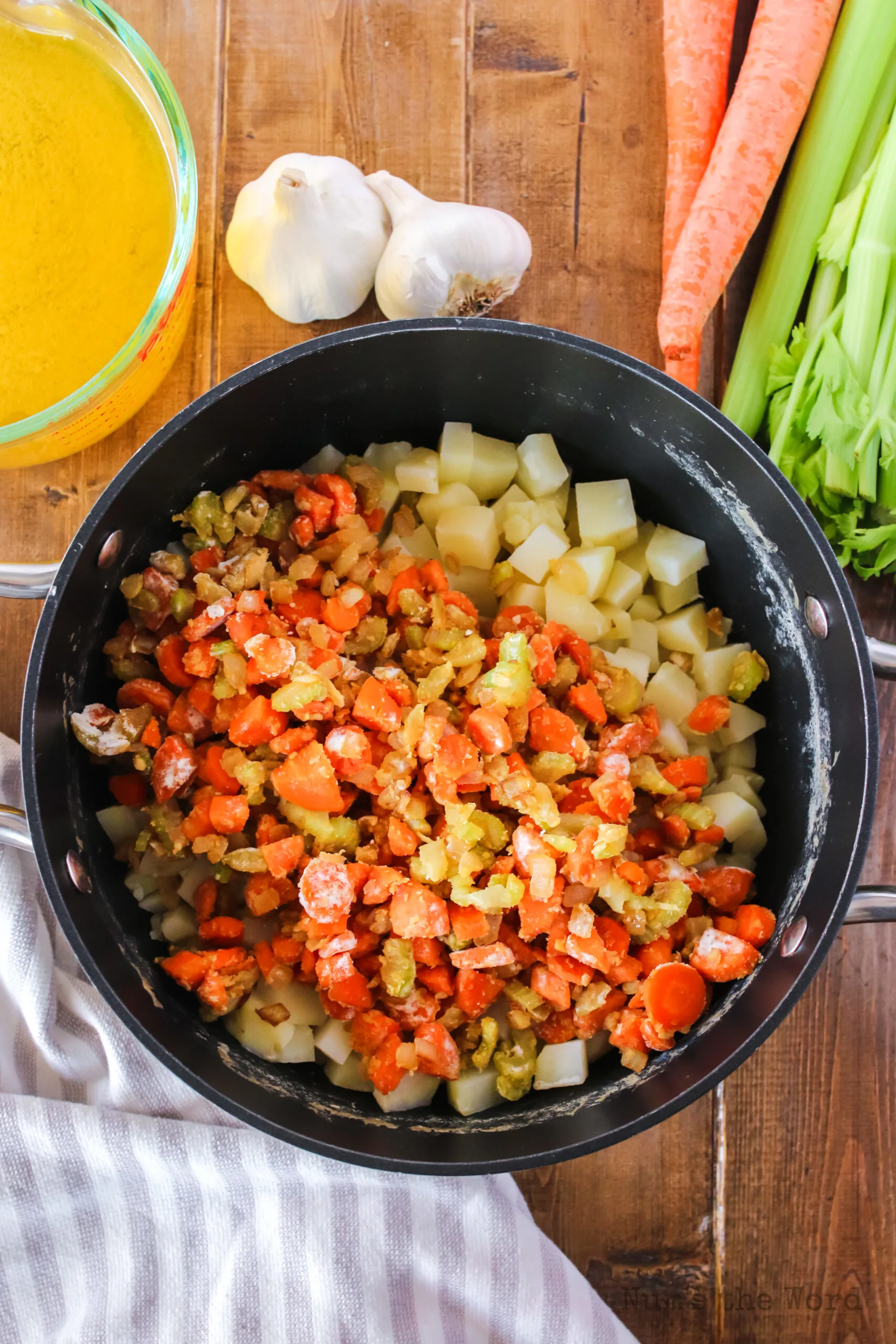 carrot mixture added to cooked potatoes.