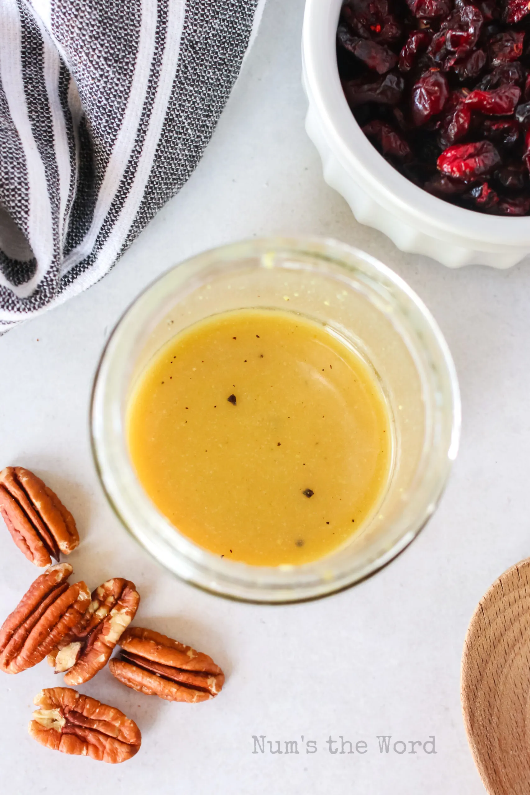 salad dressing ingredients in a jar, mixed up.