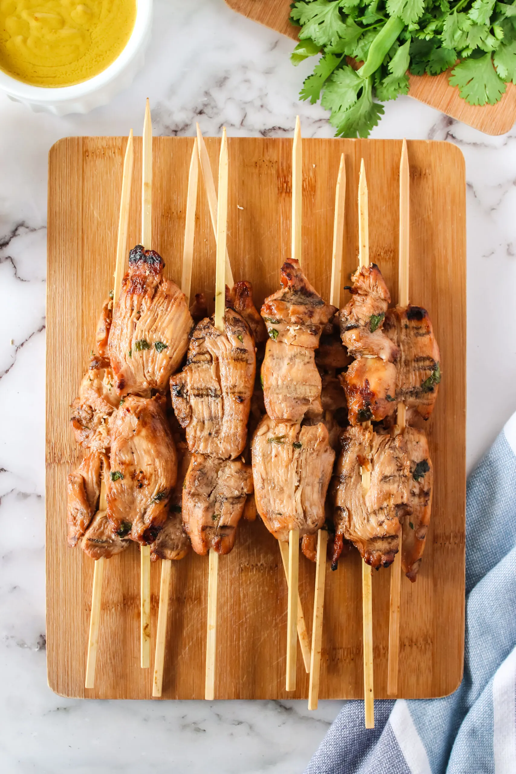 chicken skewers fresh off the grill. Image taken from the top looking down.