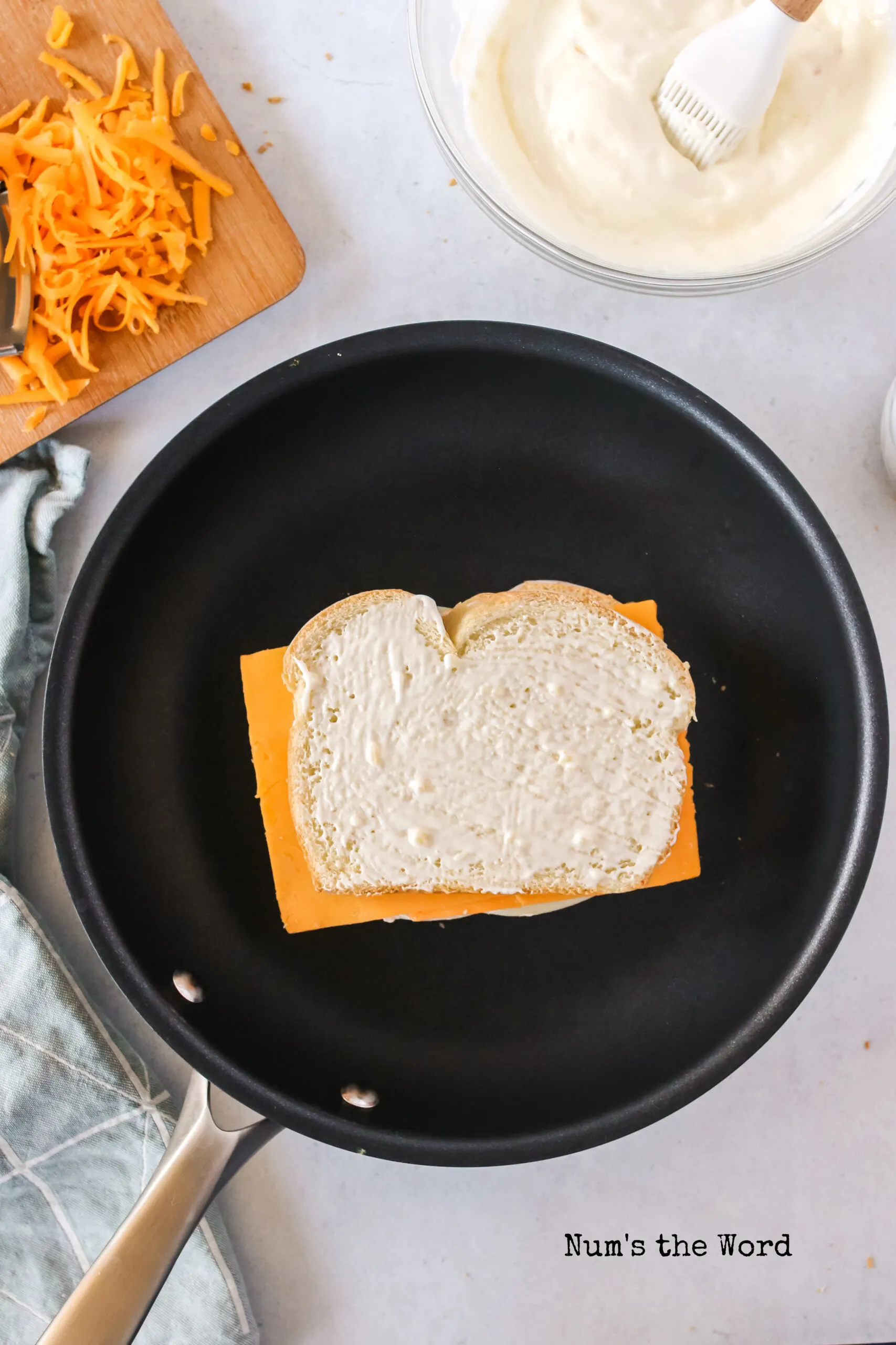 grilled cheese cooking in pan.