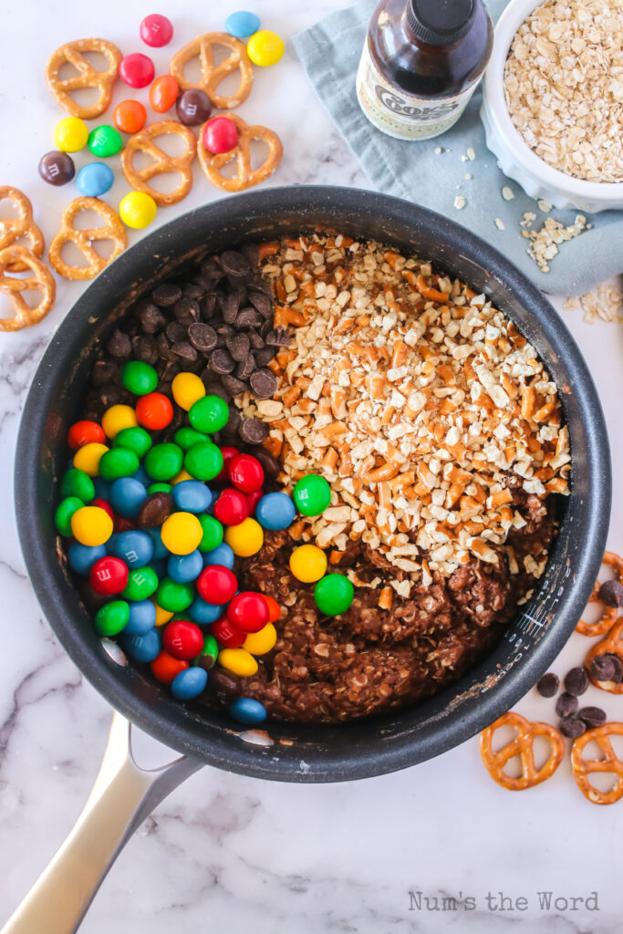 M&M's, Chocolate Chips and Pretzels all added to pot, unmixed.