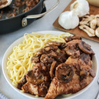 side view of chicken marsala with pasta